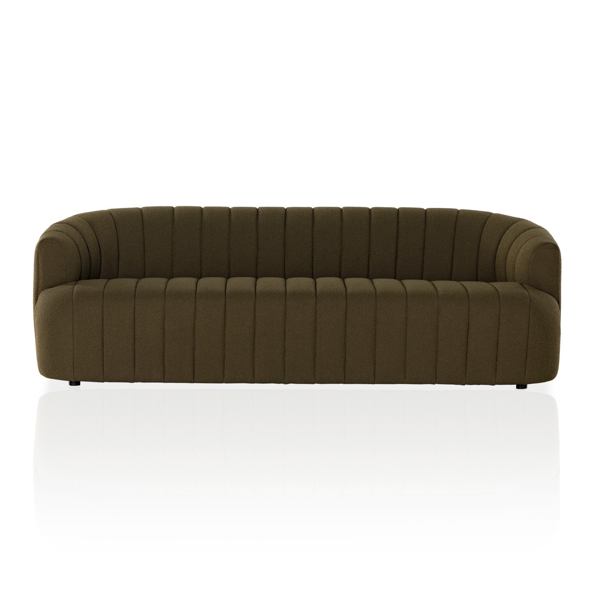 Olive sofa with channeled upholstery on a white background
