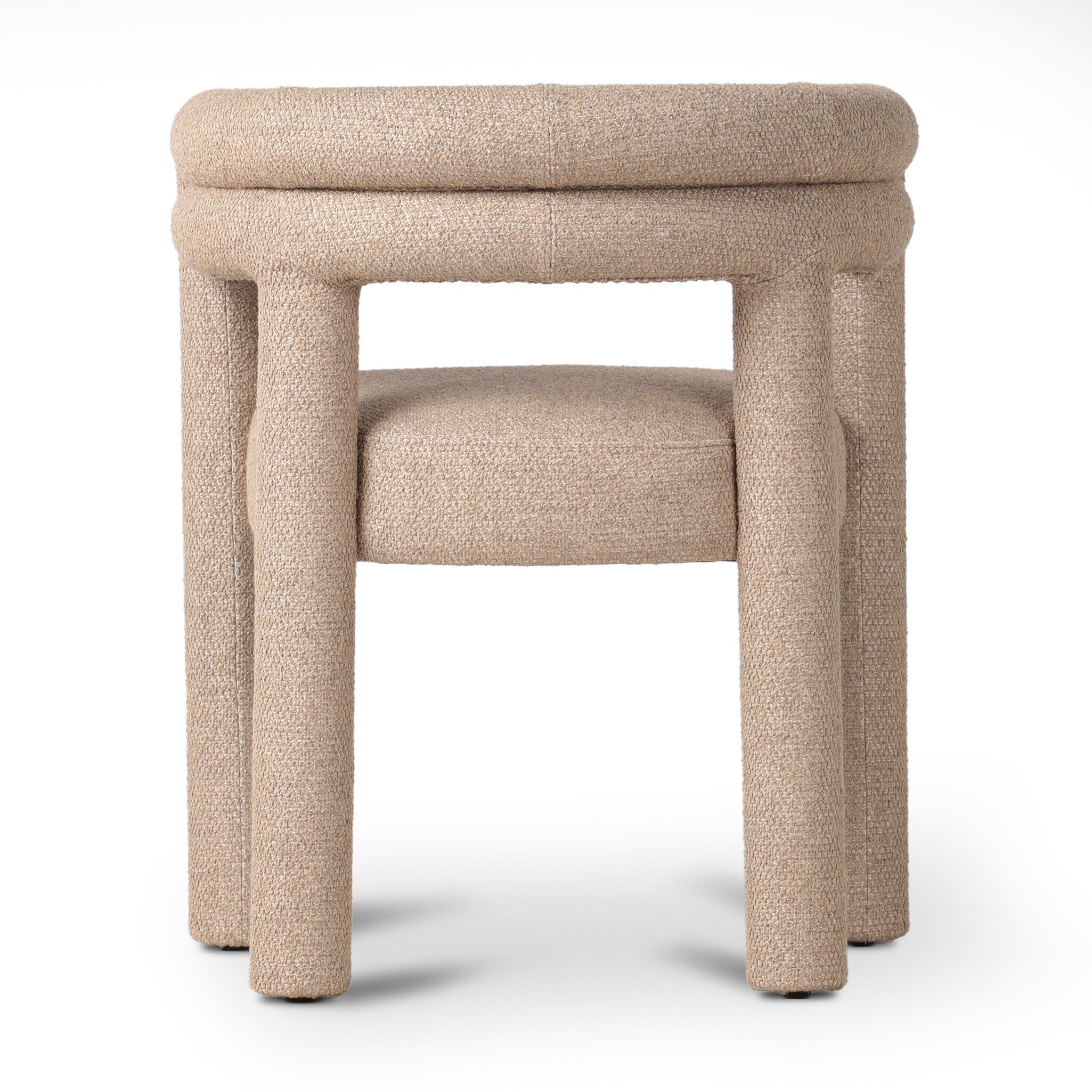 Beige textured dining chair on a white background