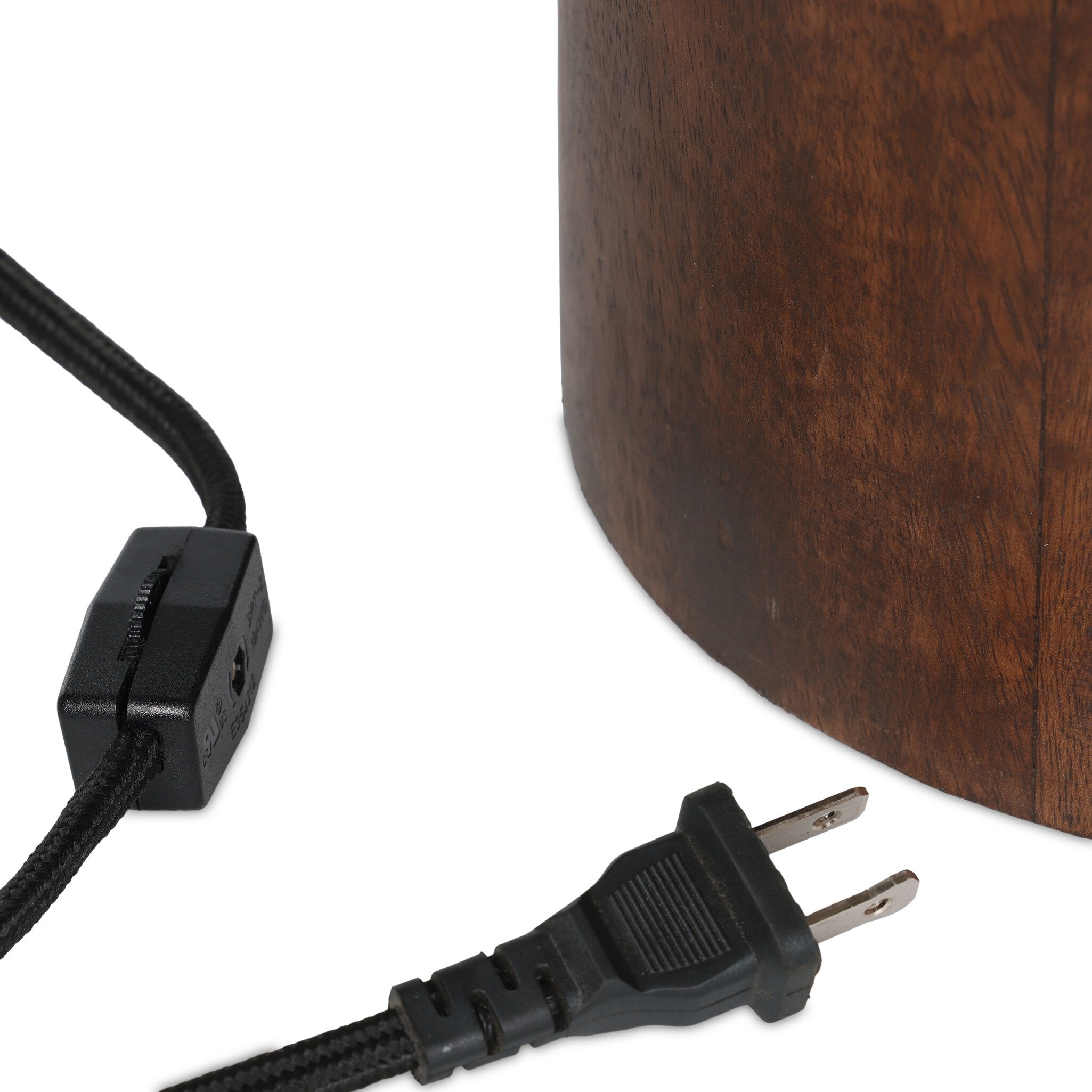 Wood lamp base with black power cord on a white background