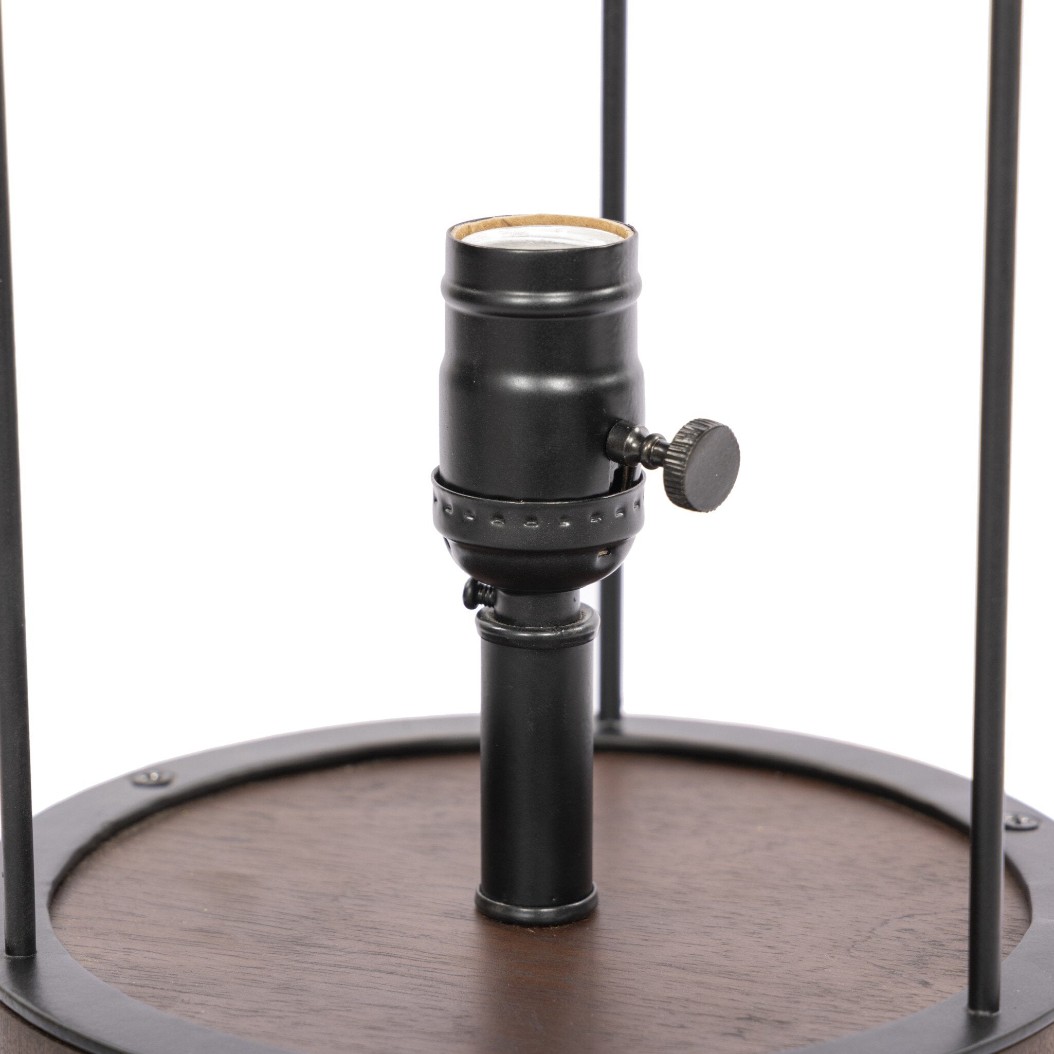 Black light socket with wooden table lamp base on a white background