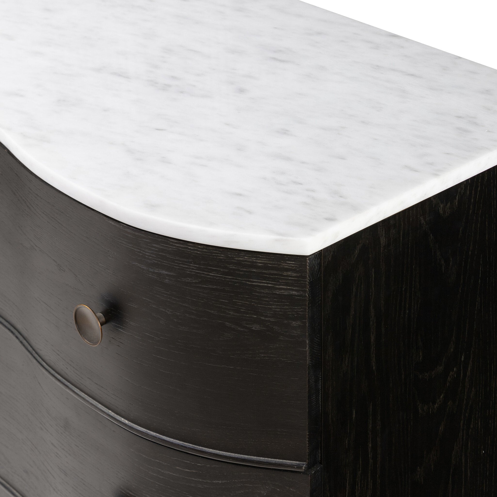 Dark wooden drawer with a white marble top