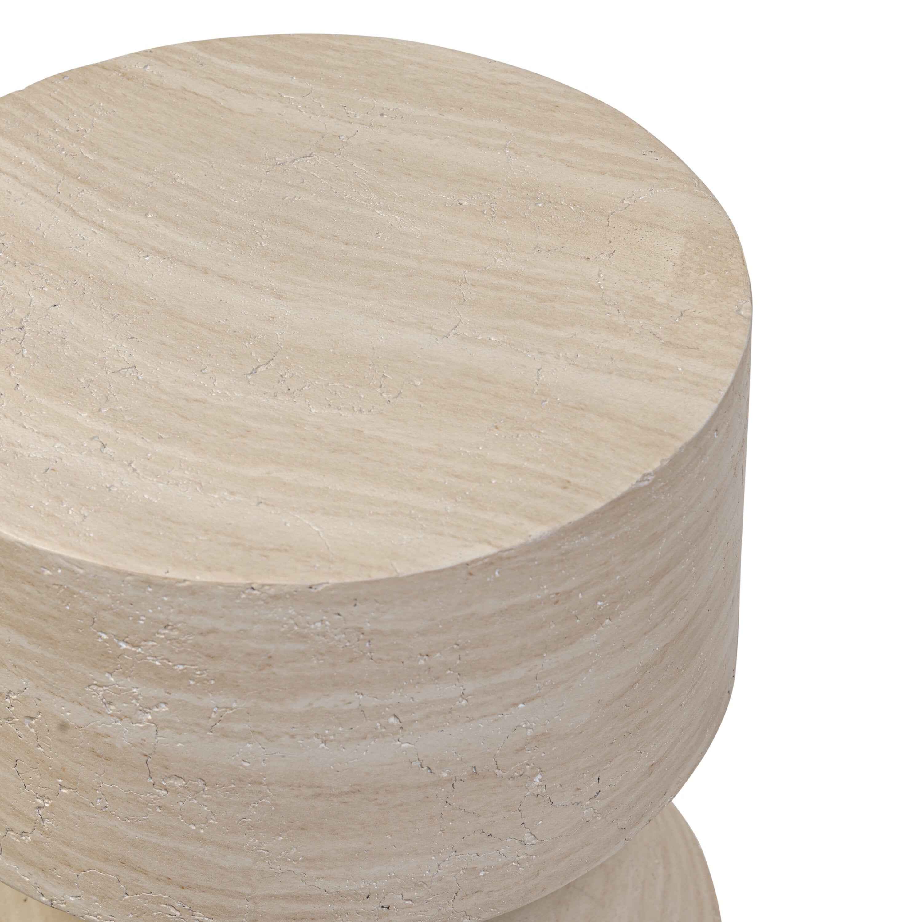 A beige concrete end table with a curved organic form and a textural sand finish.