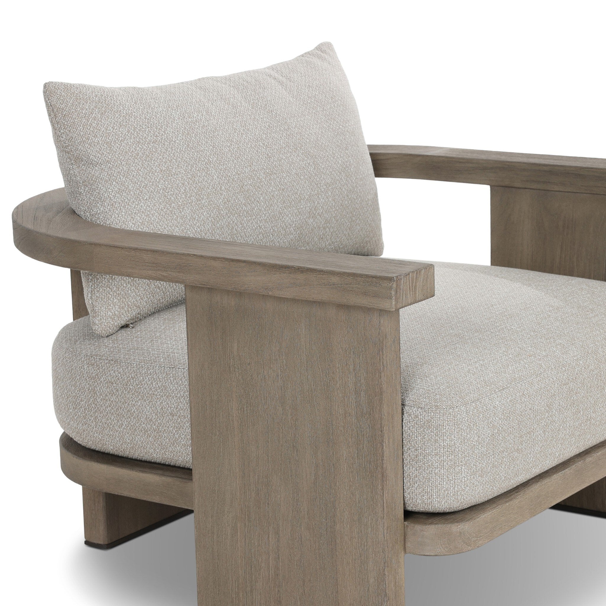 Wooden armchair with light gray cushions on a white background