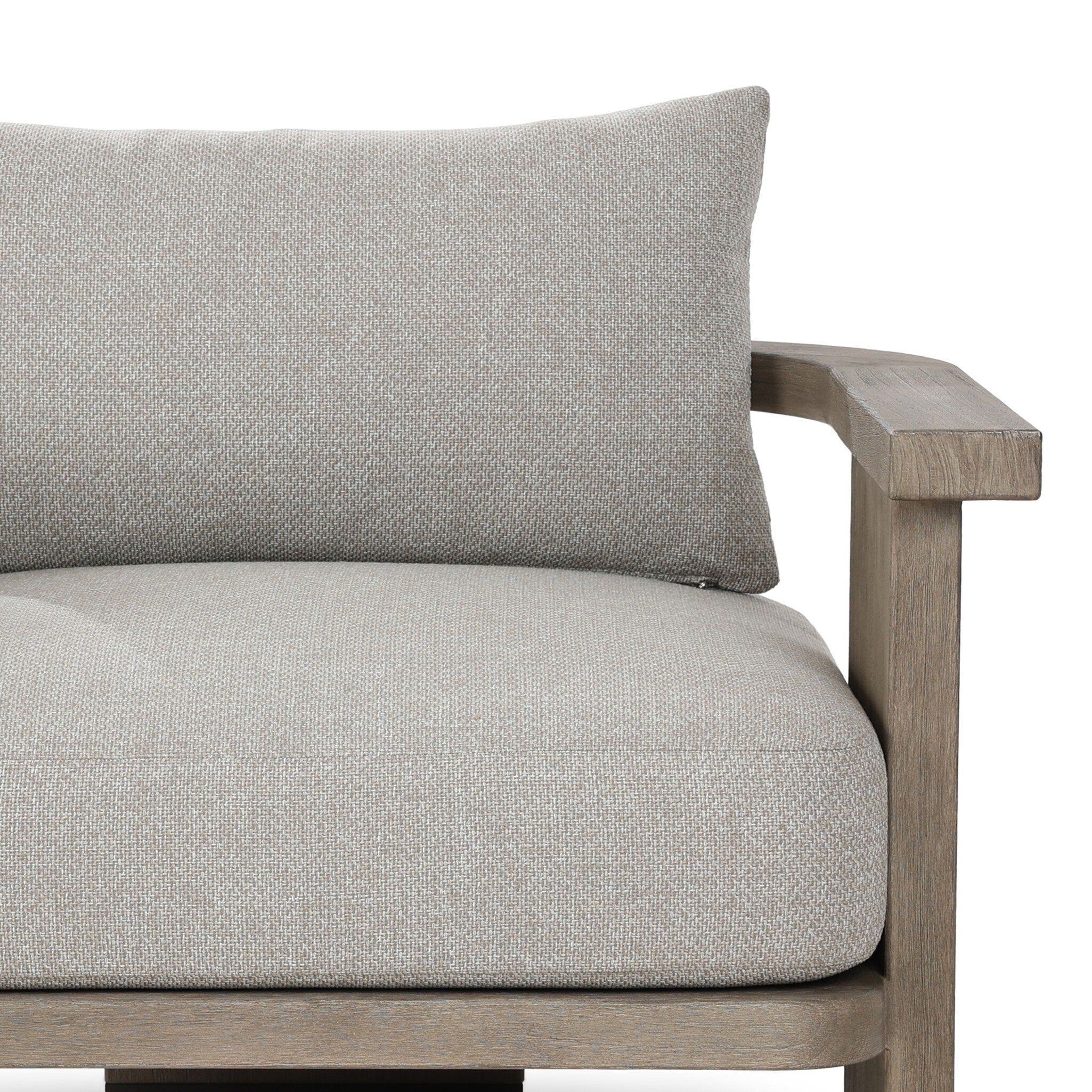 Gray cushioned chair with wooden armrests on a white background