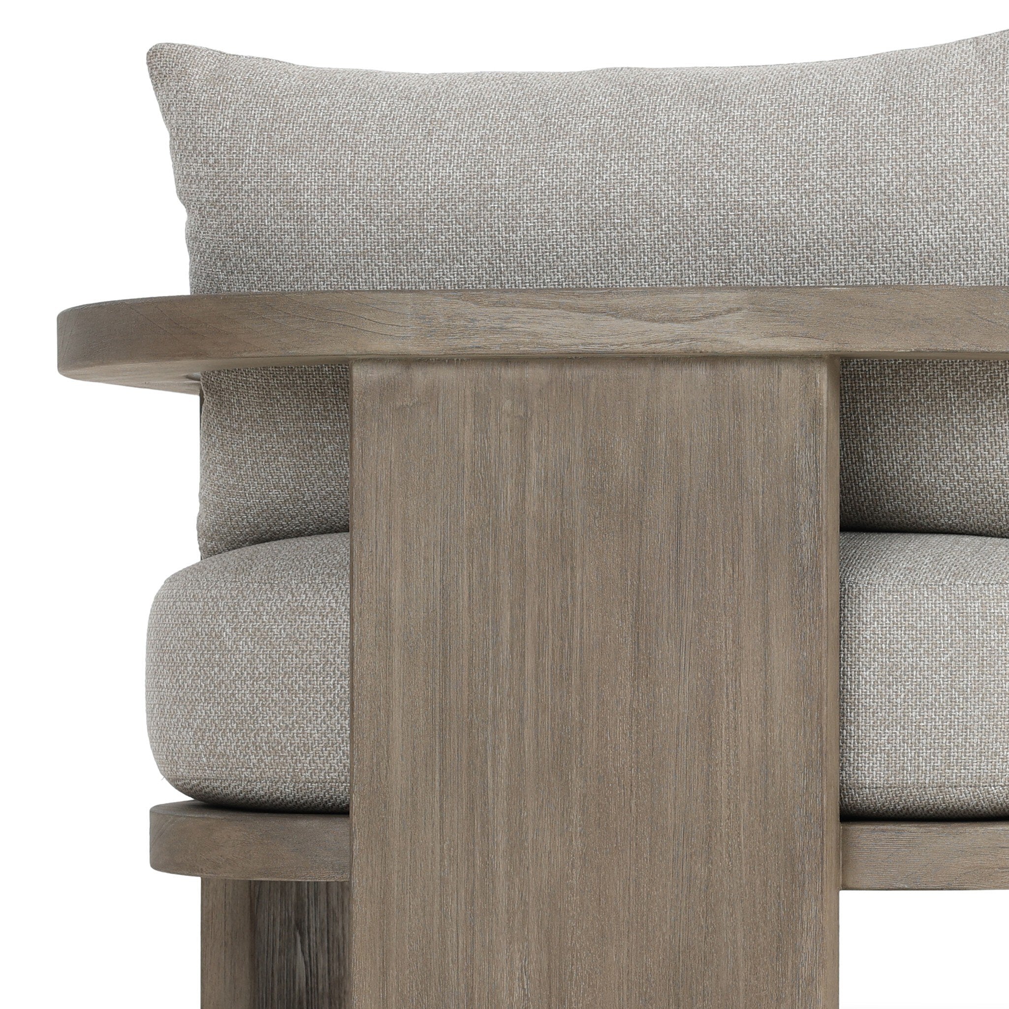 Close-up of a wooden chair with gray cushions on a white background