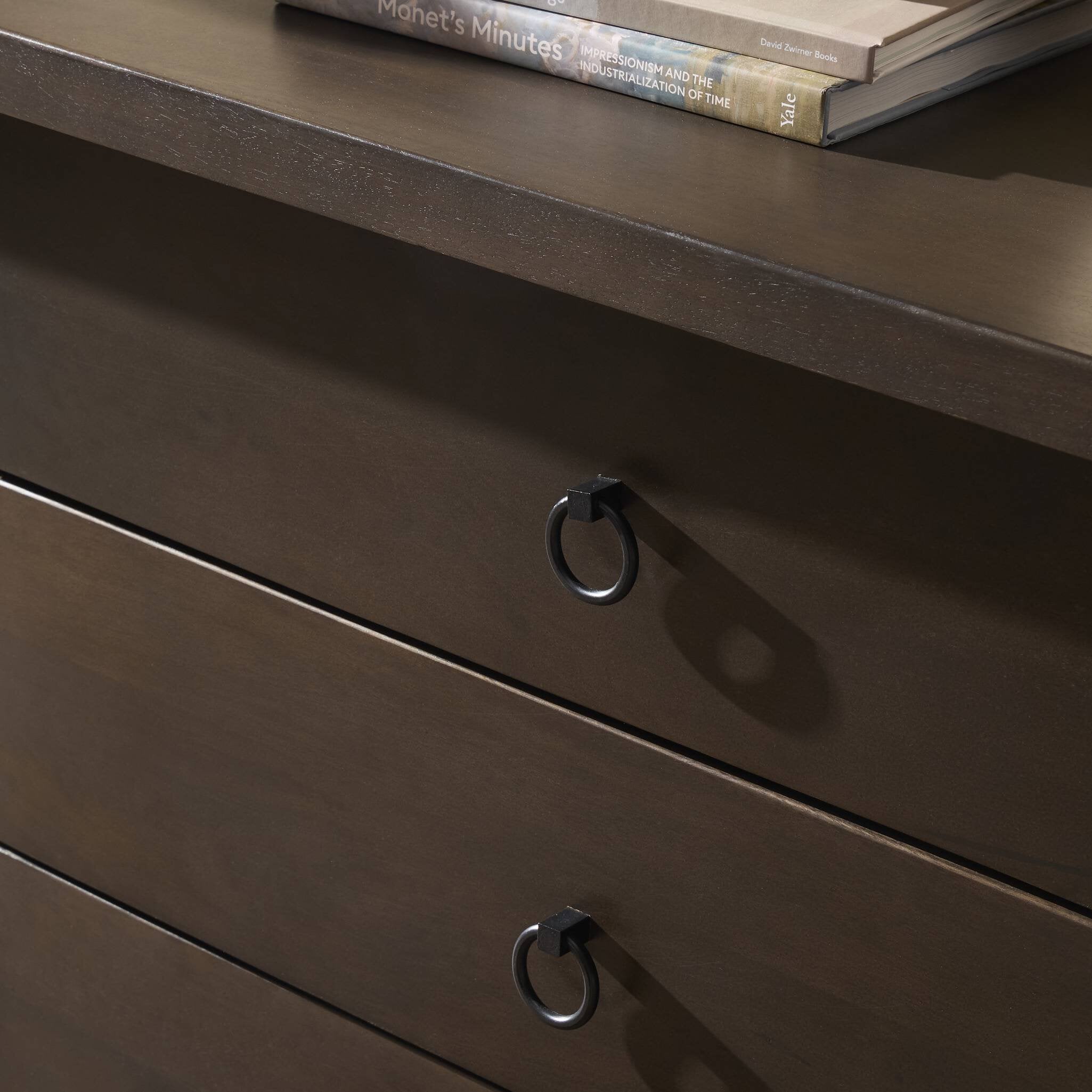Dark wooden dresser with two drawers and metal handles