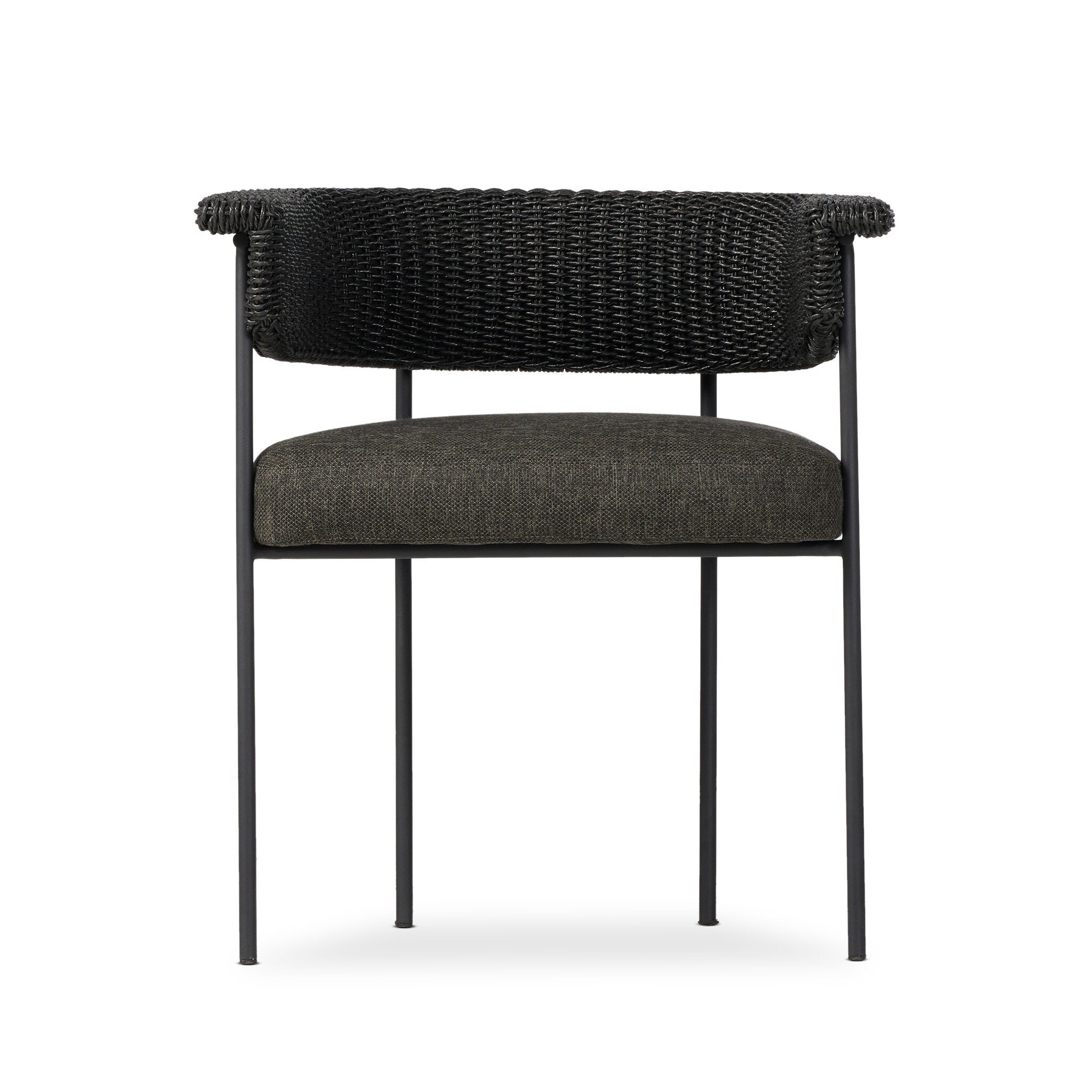 Black wicker chair with dark cushion on a white background