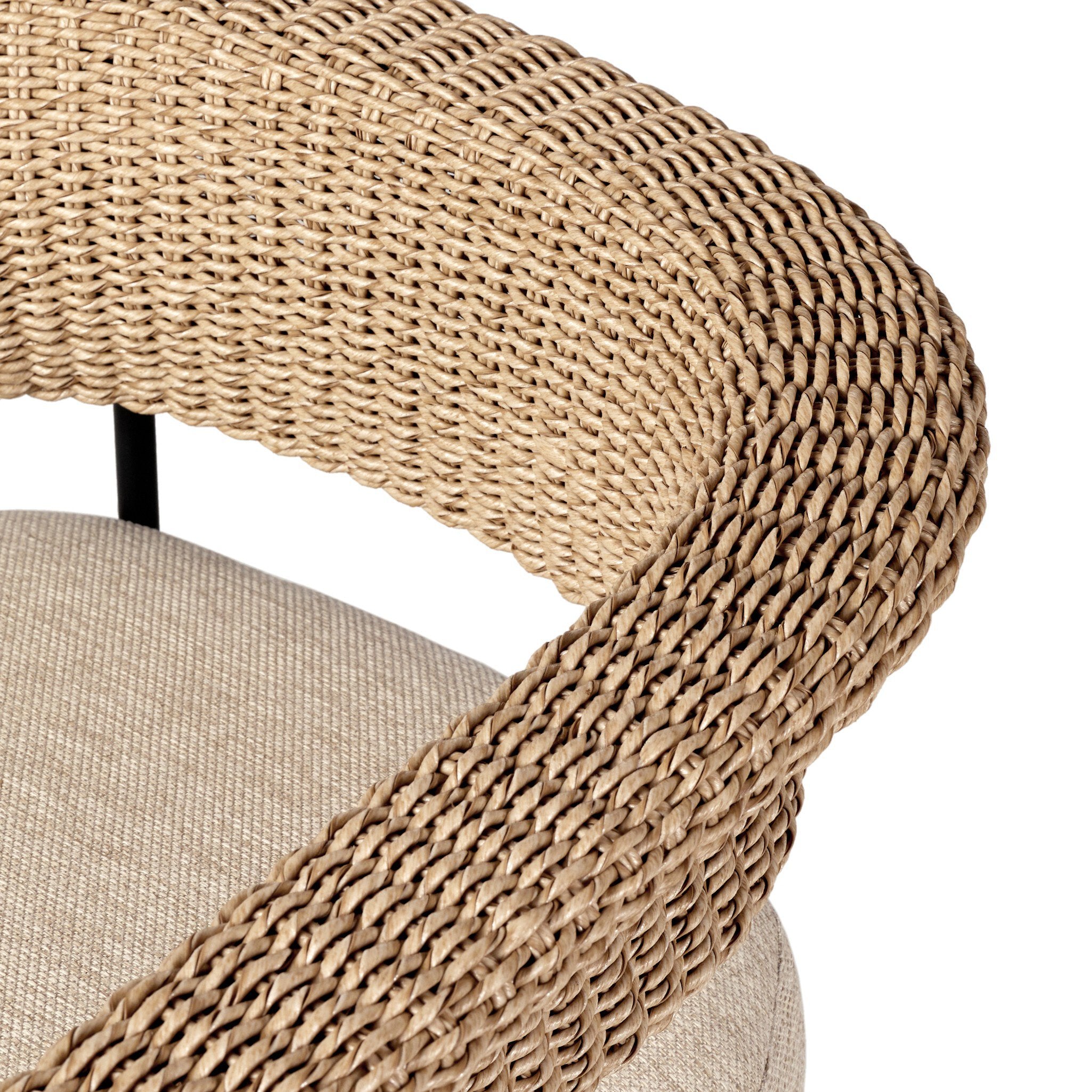 Close-up of a chair with woven backrest and beige cushion on a white background