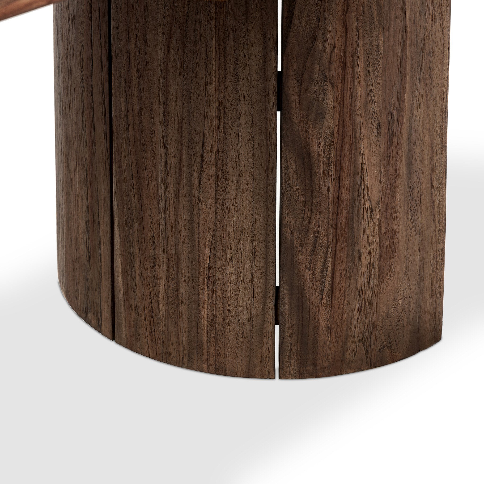 Close-up of a wooden table legl with a white background