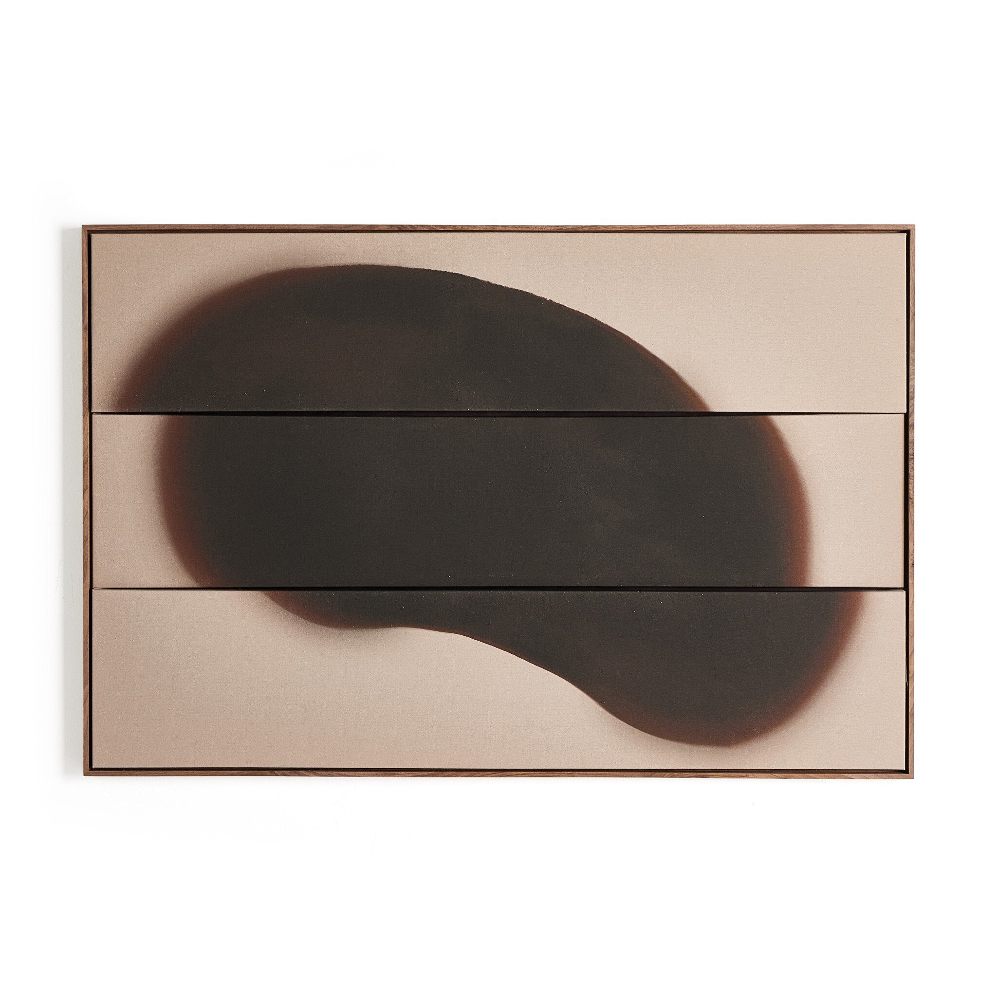 Decorative wall piece with abstract design on a white background