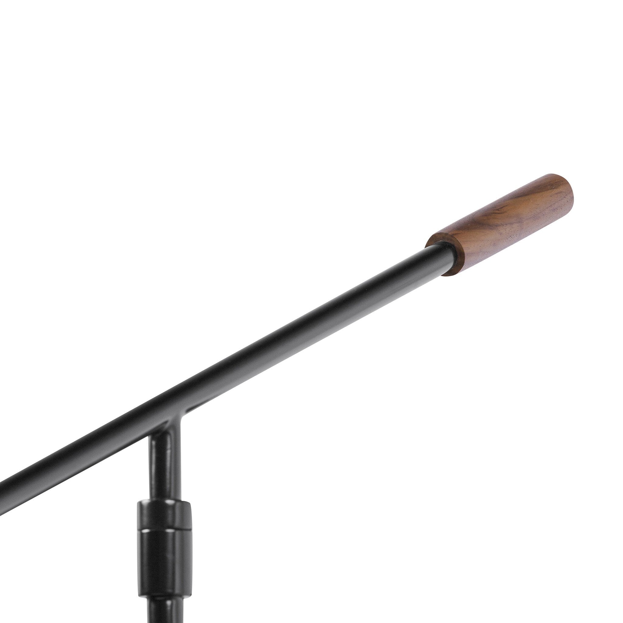 Black metal rod with a wooden handle