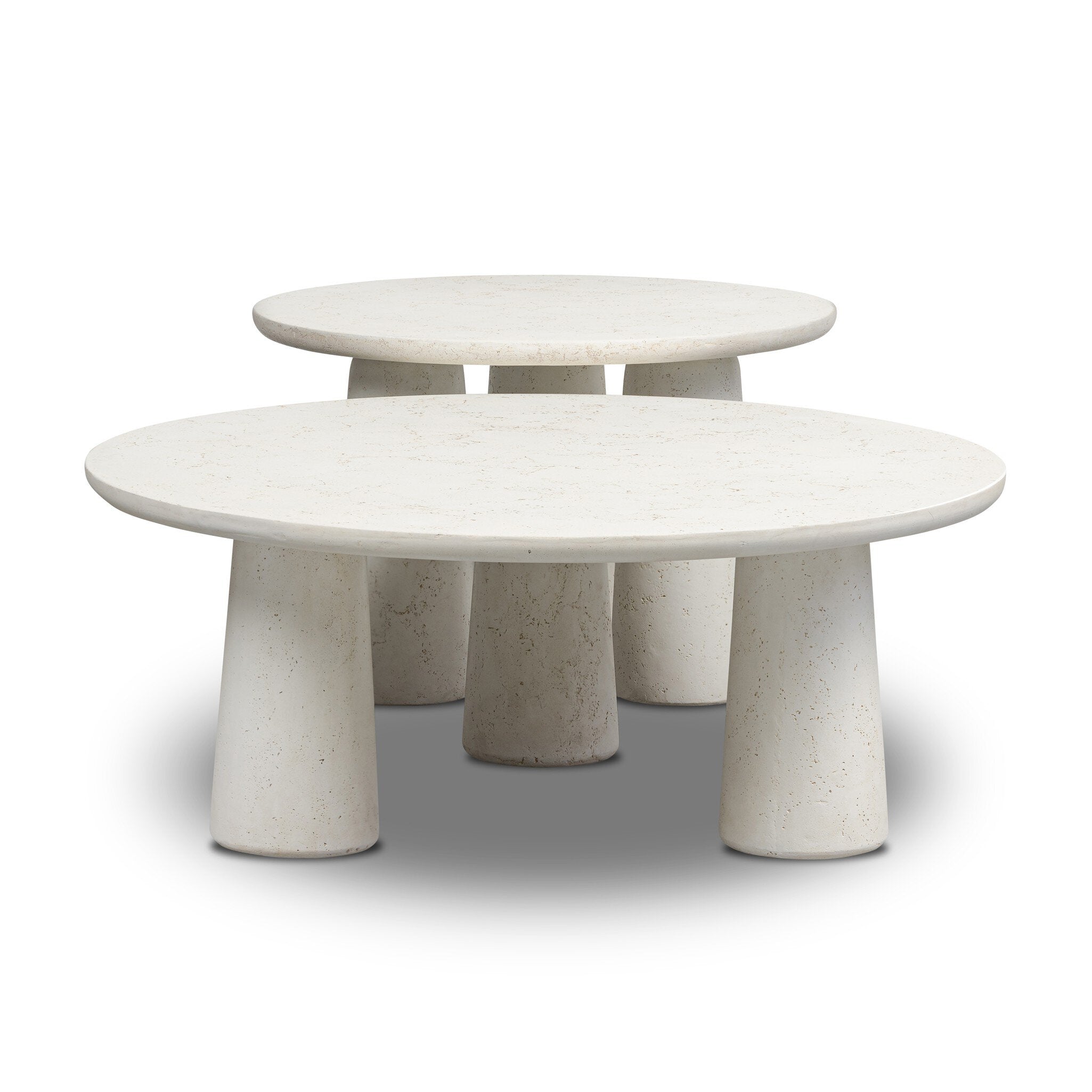 Set of two stone-like nesting tables with cylindrical bases on a white background