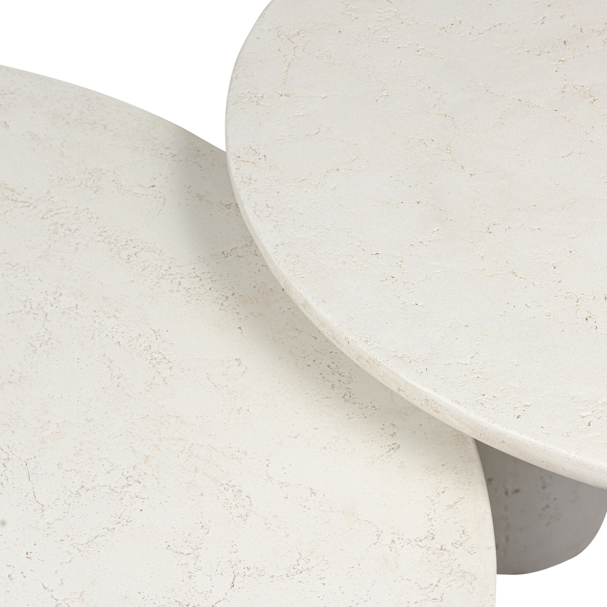 Two white stone side tables on a white background