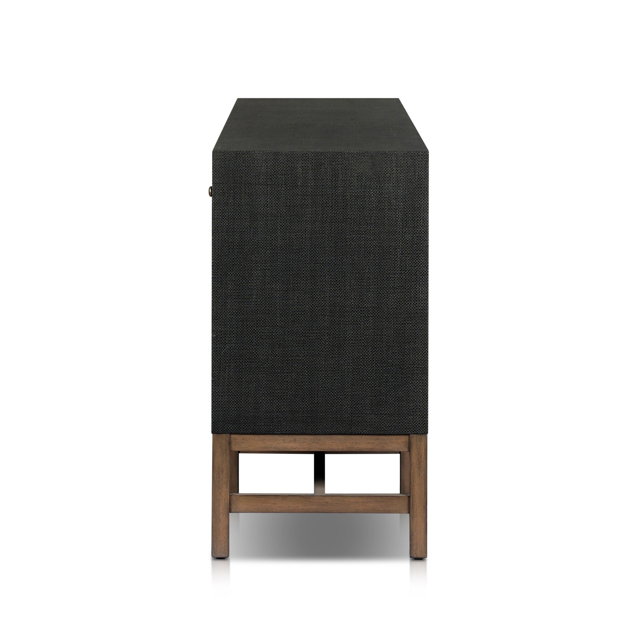 Side-view of a black raffia sideboard with wooden base on a white background