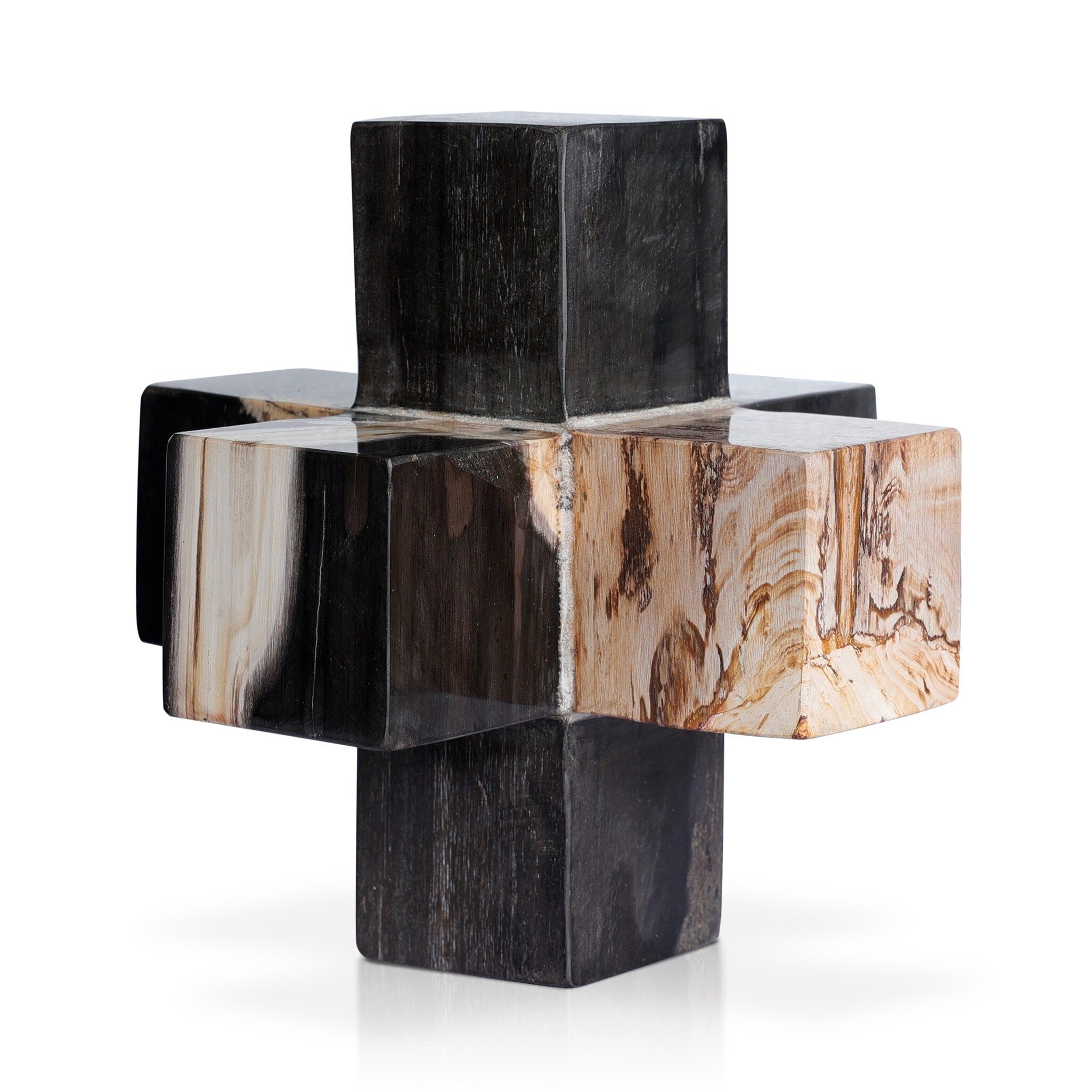 Decorative sculpture with geometric design on a white background