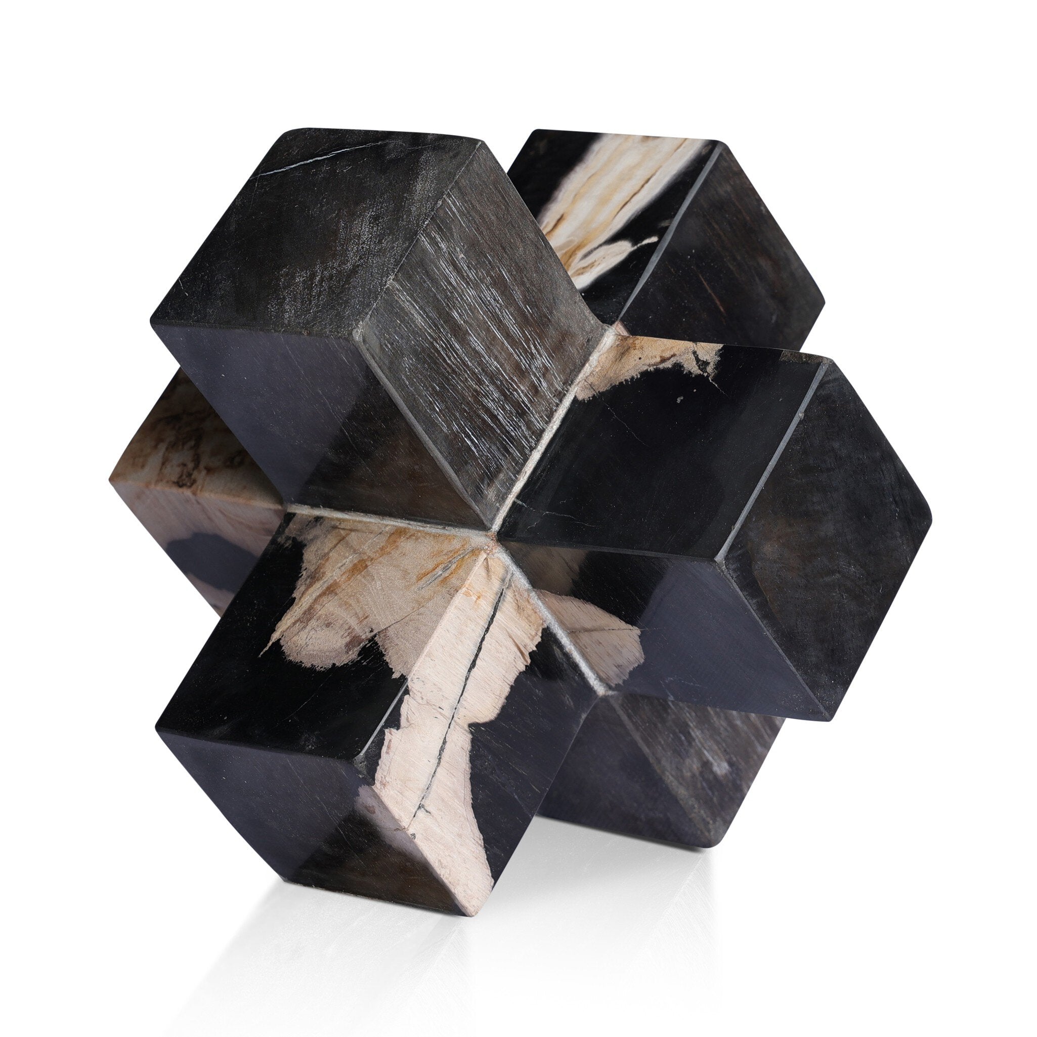 Geometric petrified wood sculpture with black and beige patterns on a white background