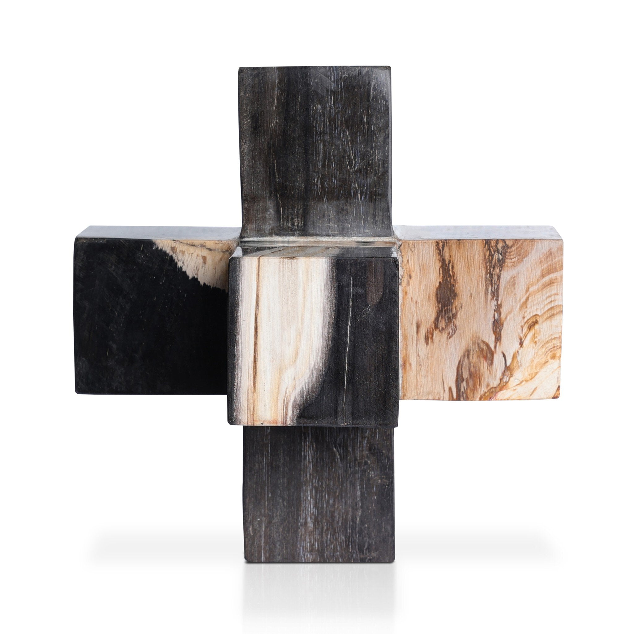 Decorative object with cross design featuring black, white, and brown marbled patterns on a white background.