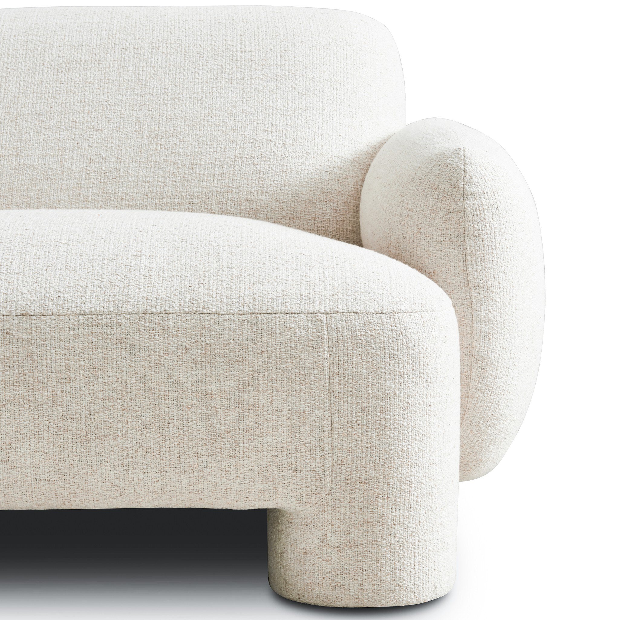 Beige fabric armchair on a white background