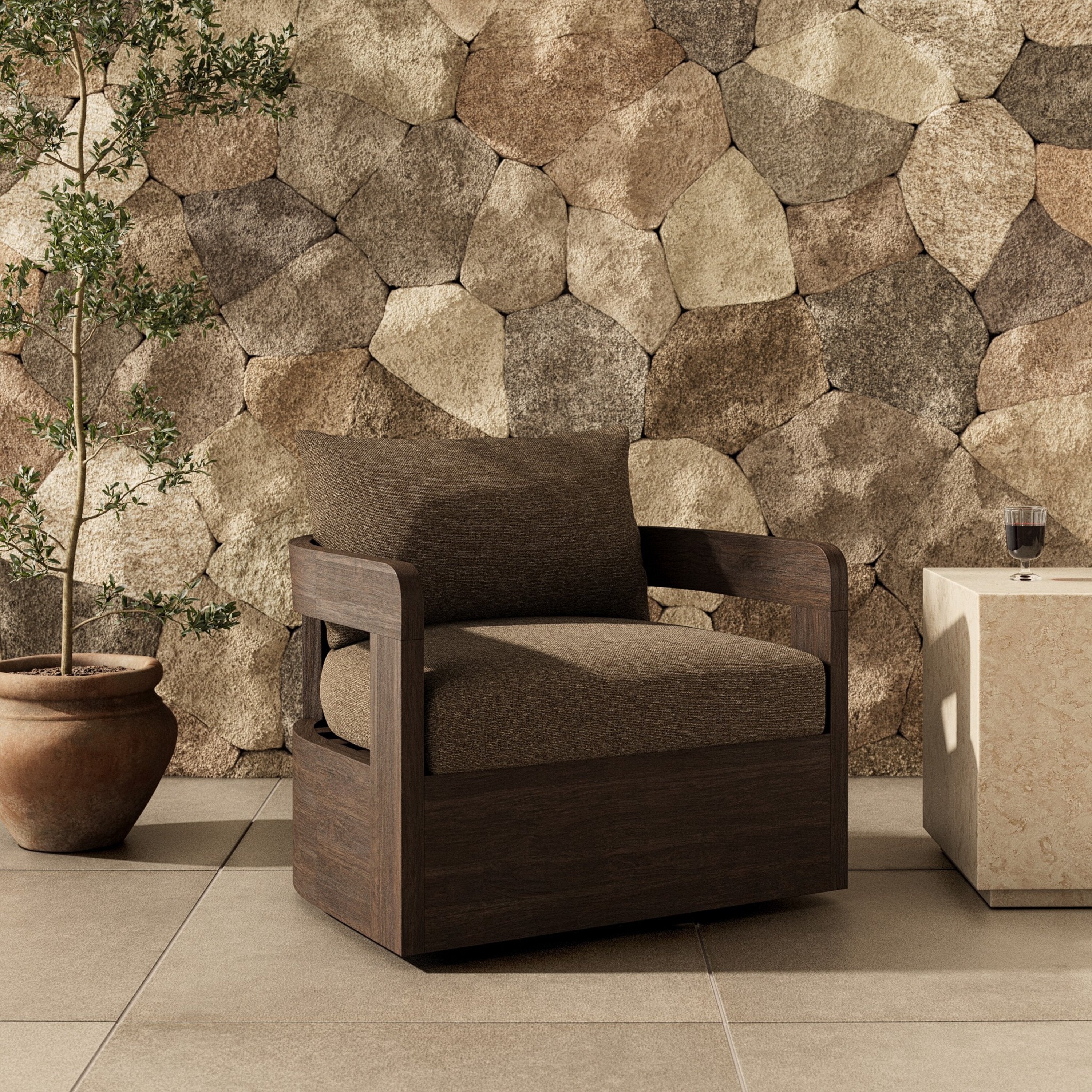 A brown upholstered Jackson Outdoor Swivel Chair with a teak wood frame and a cushion on it, against a white background.