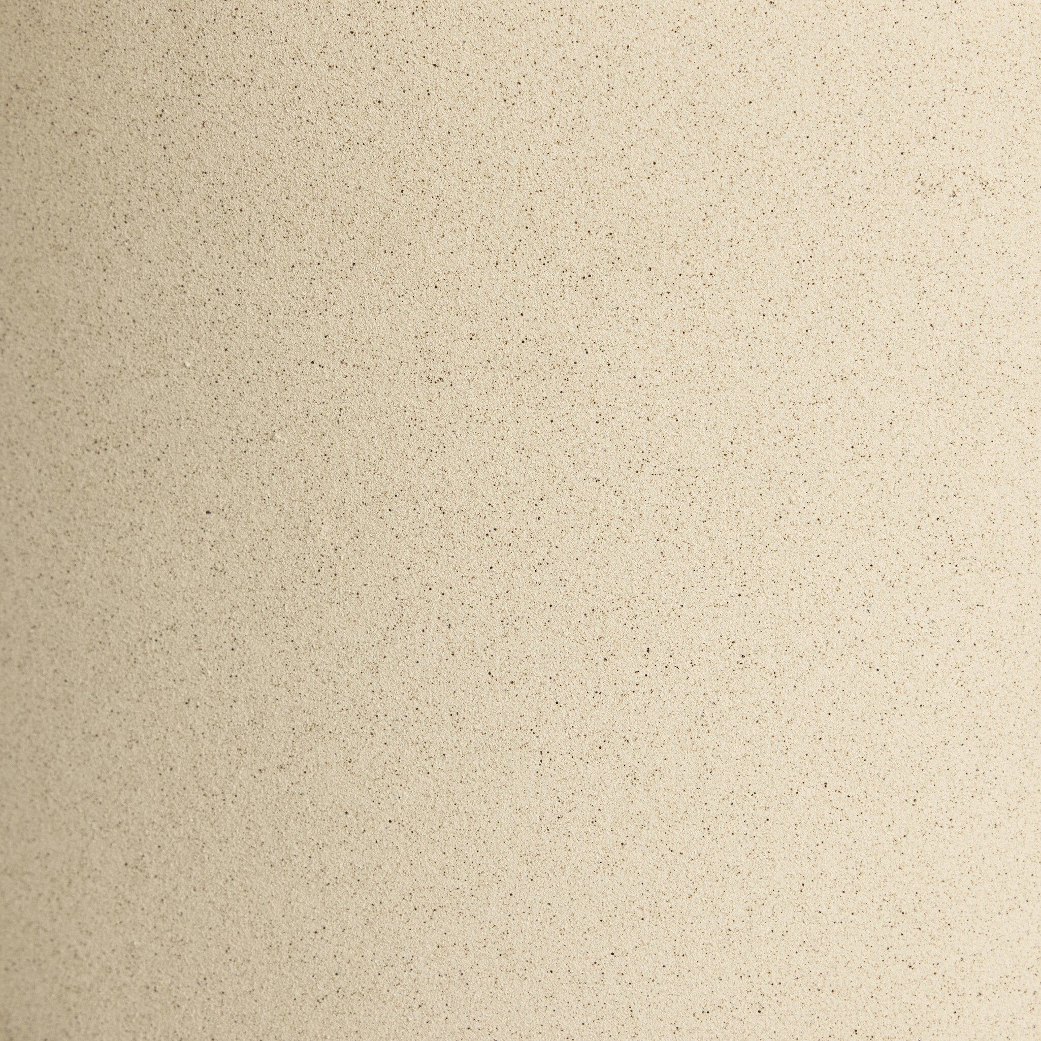 Beige color swatch with a subtle speckled pattern