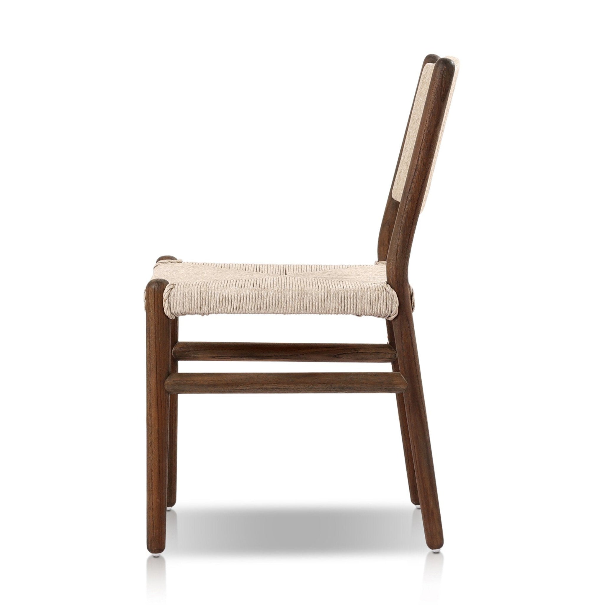 Wooden chair with a white woven cushion on a white background