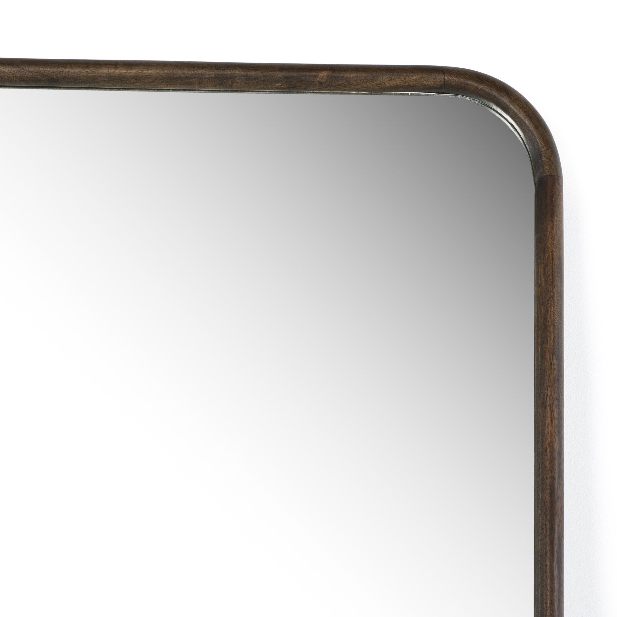 Rectangular mirror with a bronze frame on a white background
