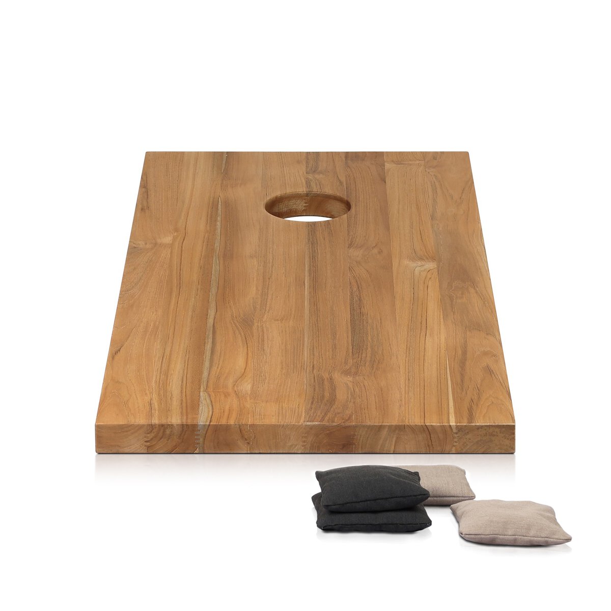 Wooden cornhole board with four bags on a white background