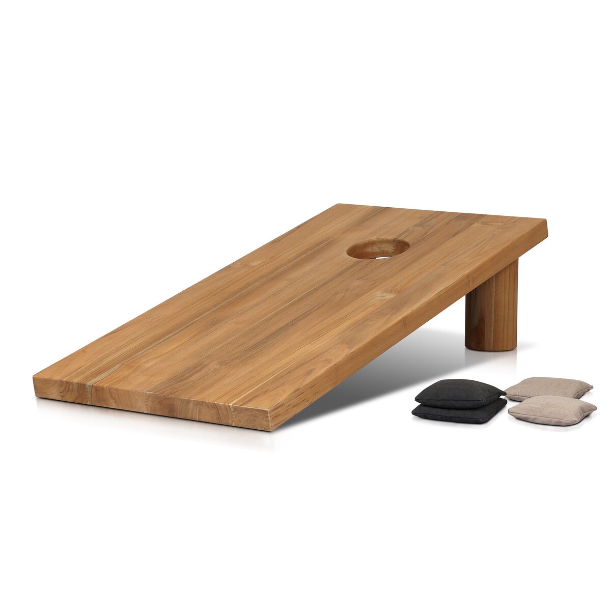 Wooden cornhole board with bags on a white background