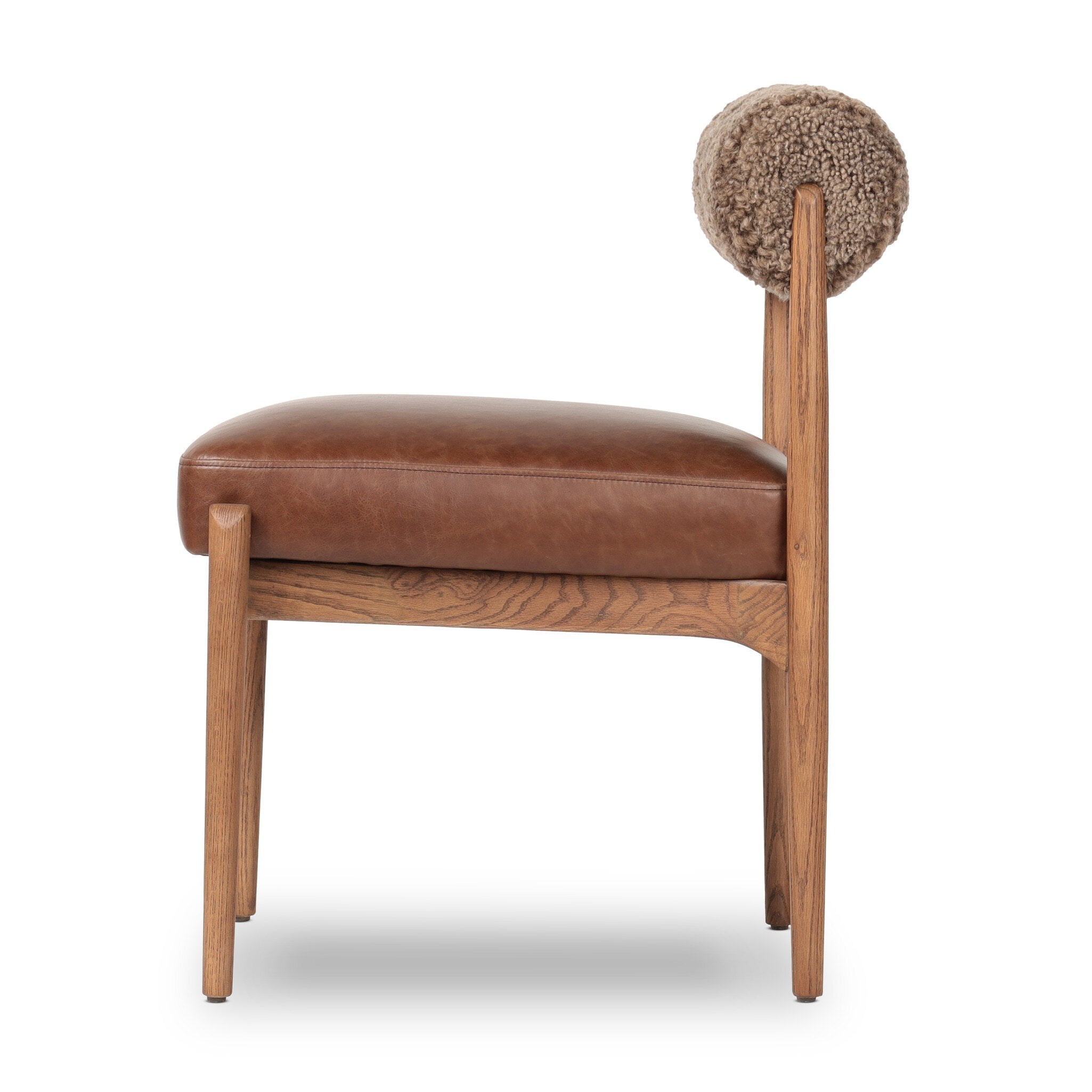 Brown leather chair with wooden frame and textured backrest on a white background