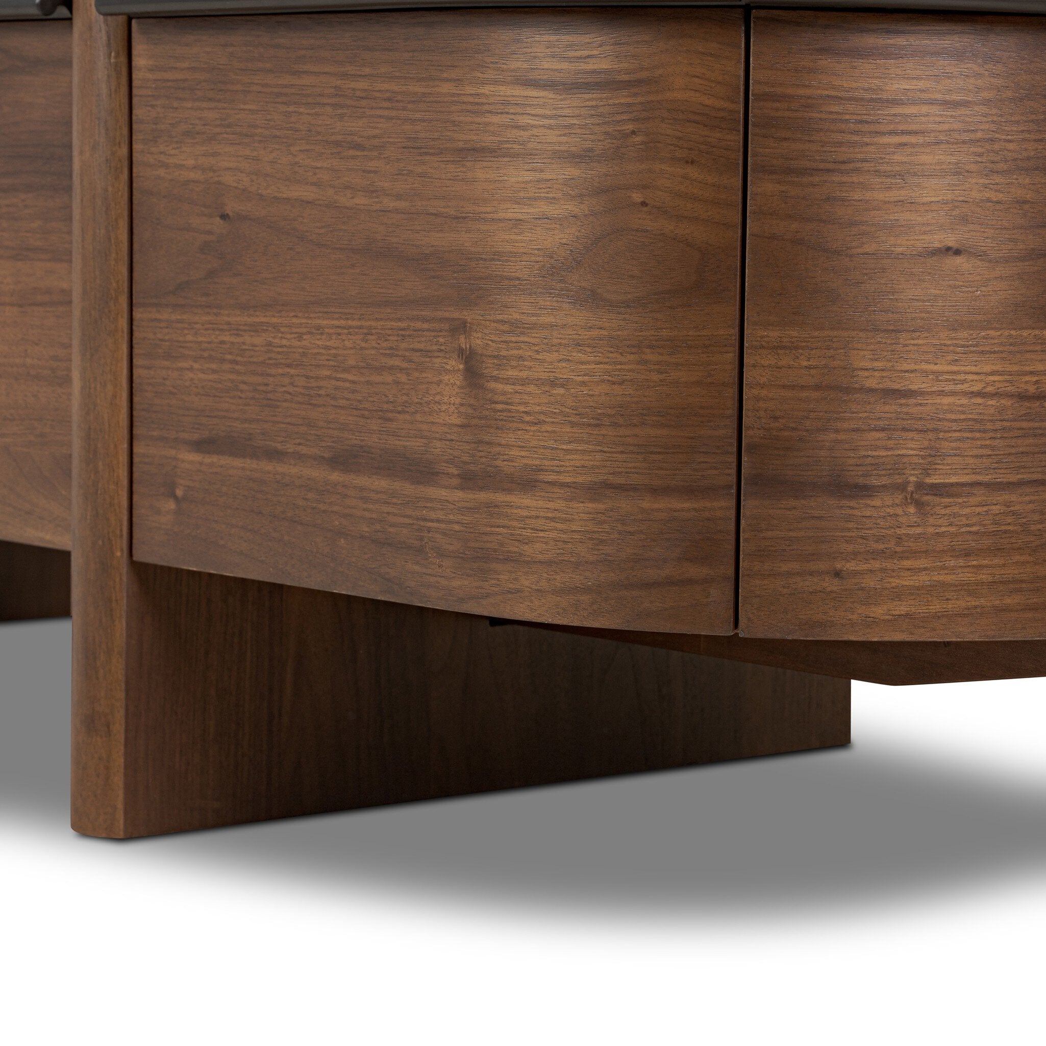 Close-up of a wooden cabinet with a focus on the wood grain and texture.