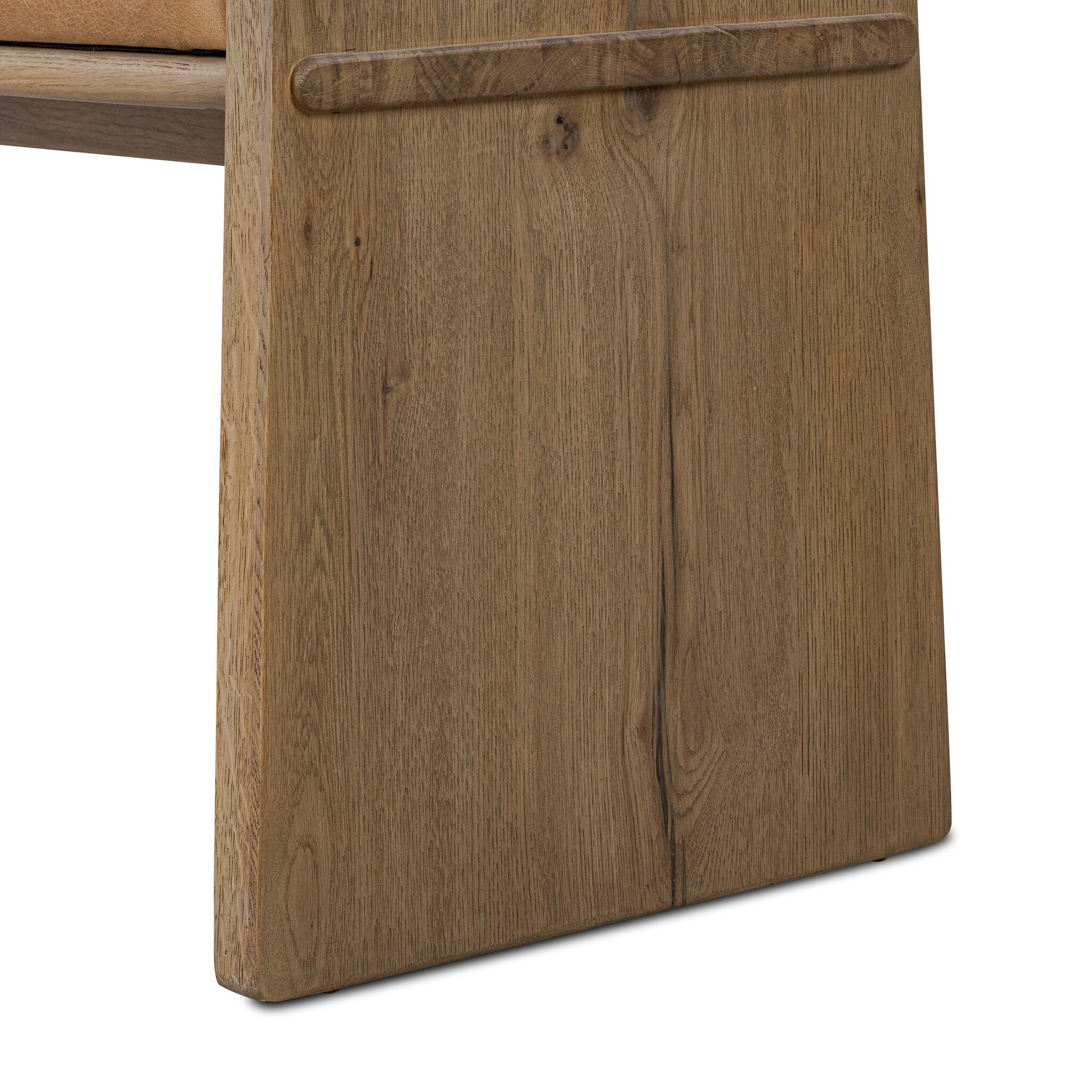 Close-up of a wooden bench leg with a visible grain pattern on a white background