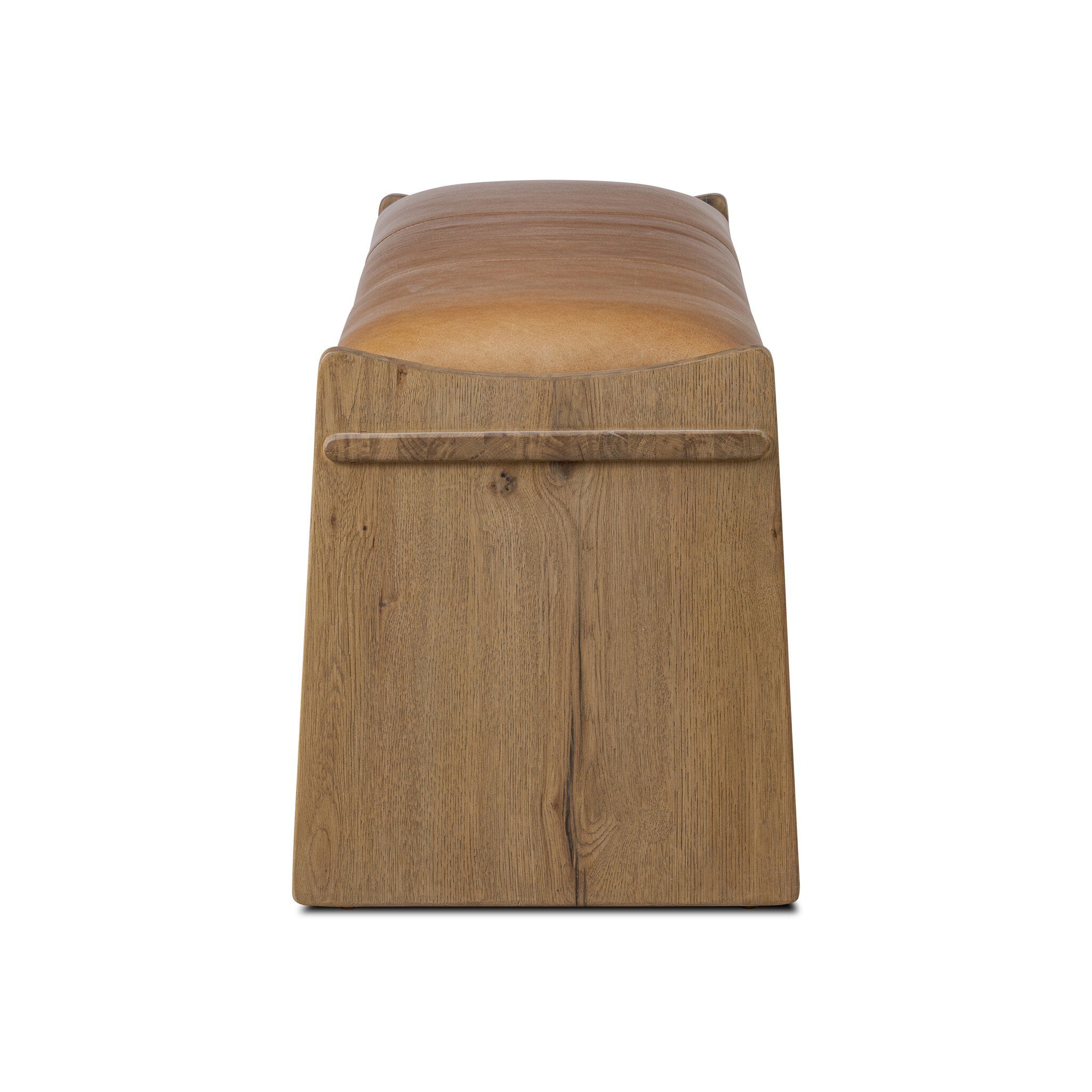 Wooden ottoman with a leather cushion on a white background