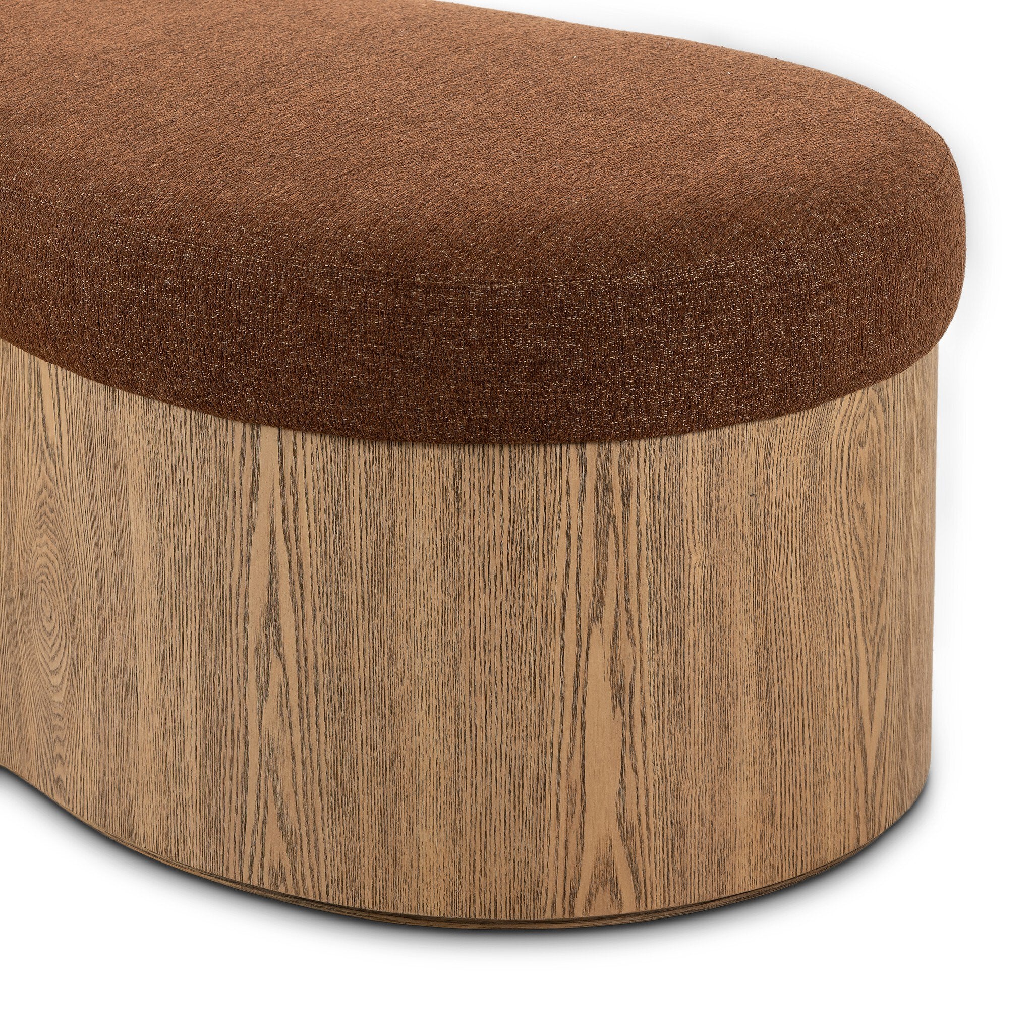 Brown upholstered bench with wooden base on a white background