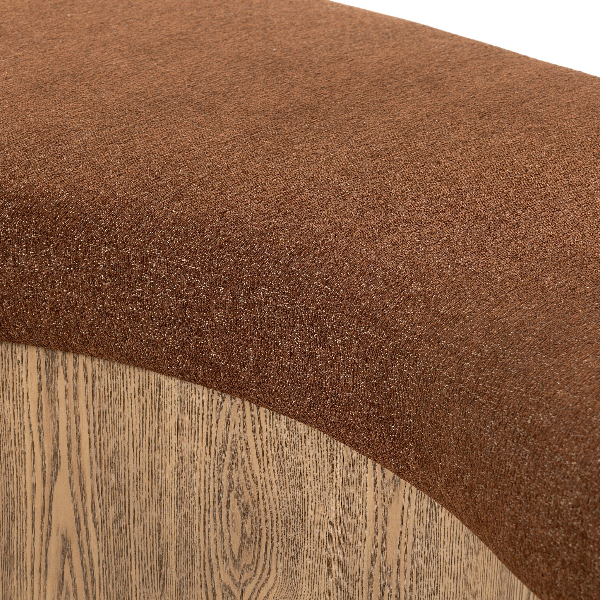 Brown textured fabric on a wooden bench
