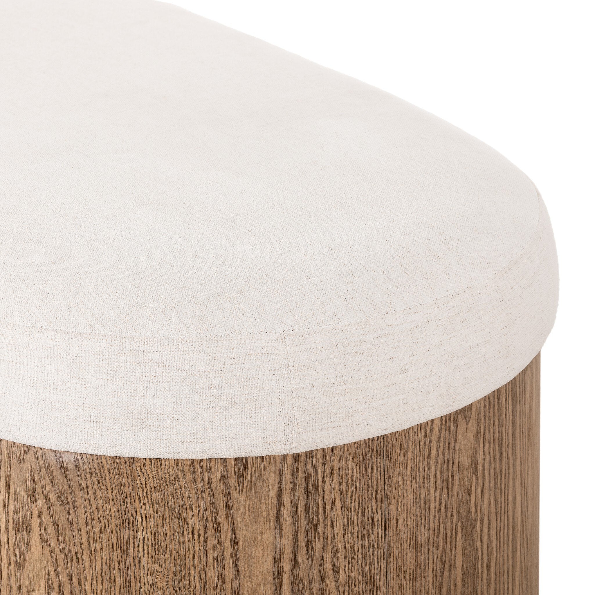 Wooden bench with a white cushioned seat on a white background