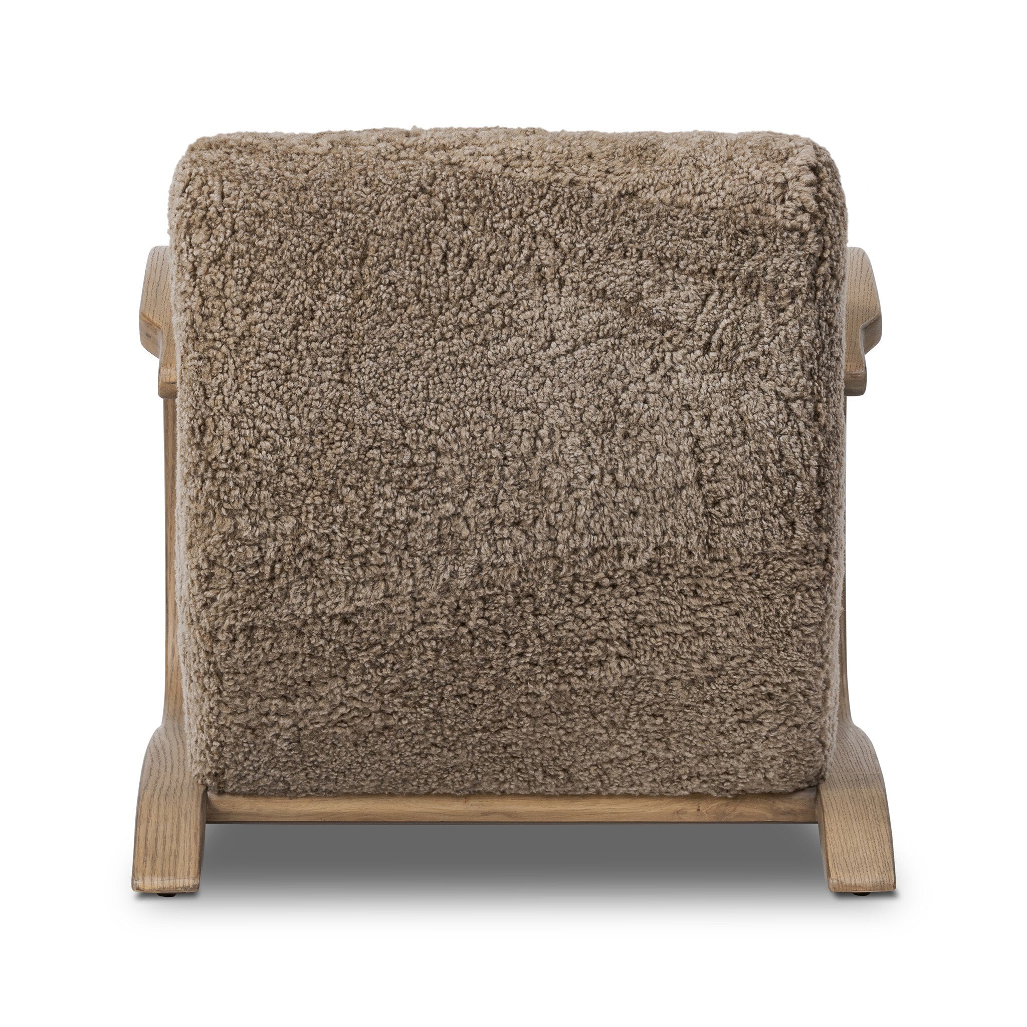 Brown textured blanket on a wooden chair with a white background
