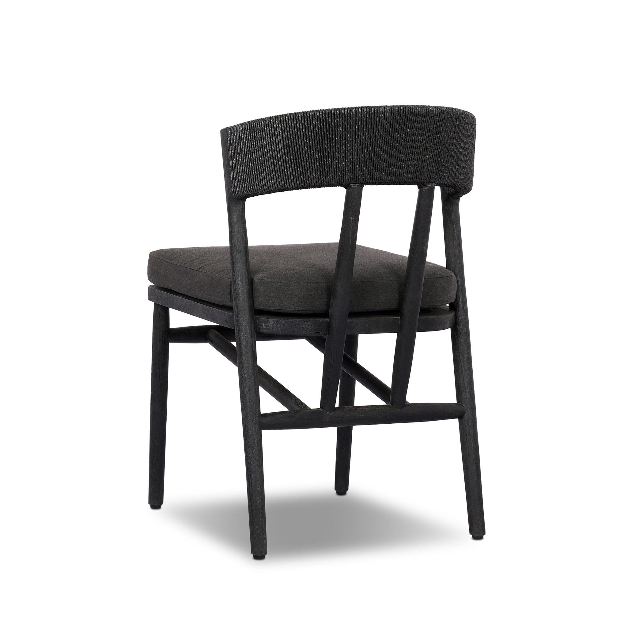 Black chair with woven backrest on a white background
