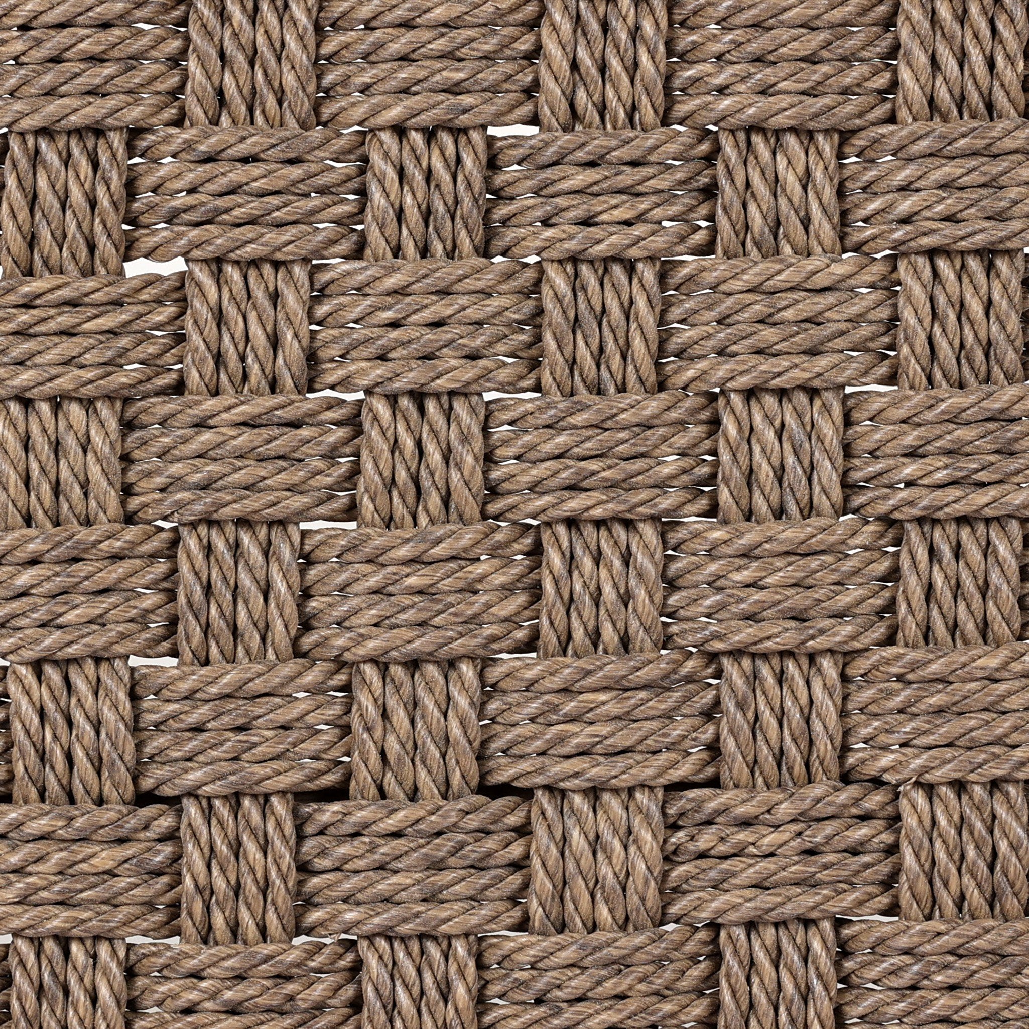 Close-up of a woven pattern made from brown ropes