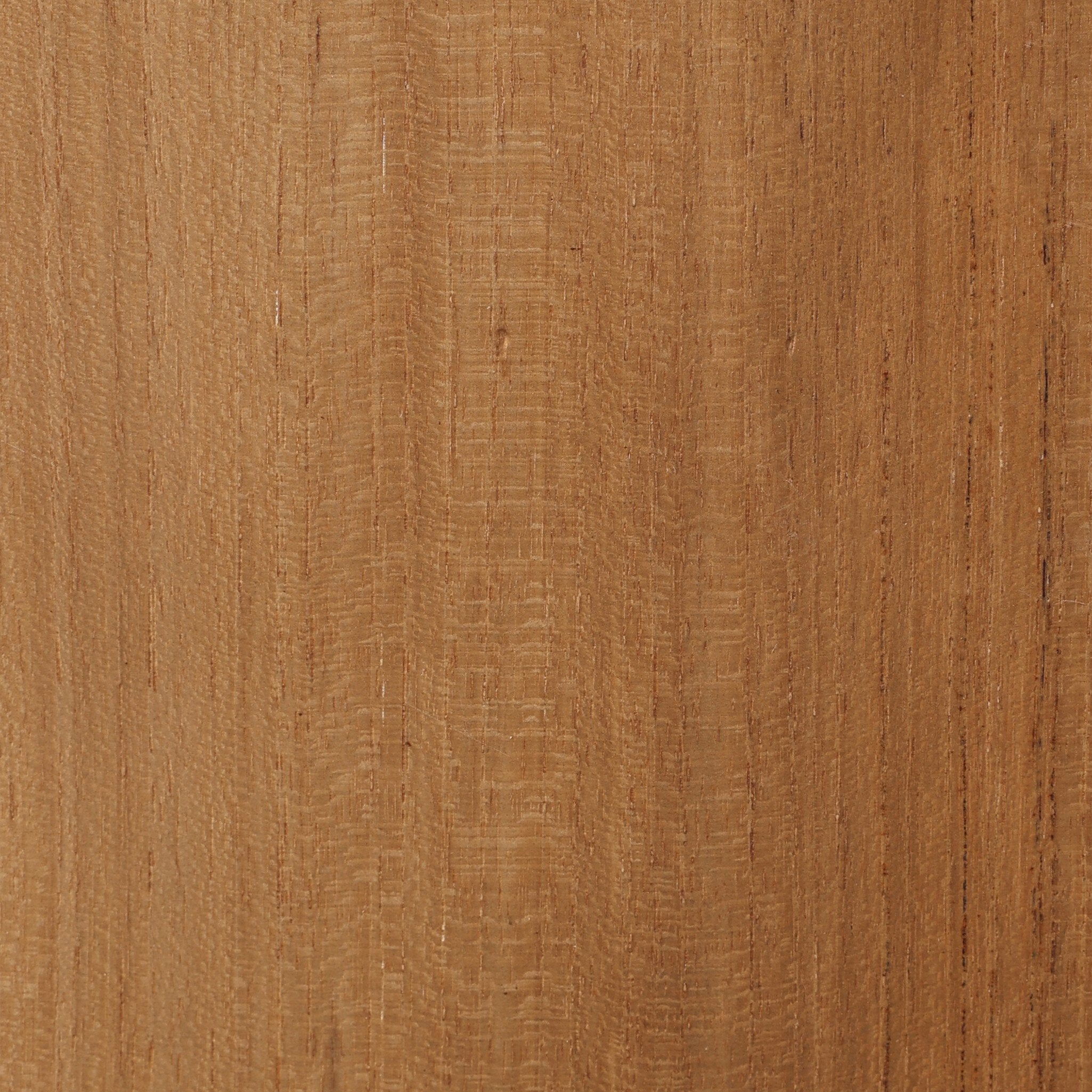 Close-up of a wooden surface with a warm brown color.