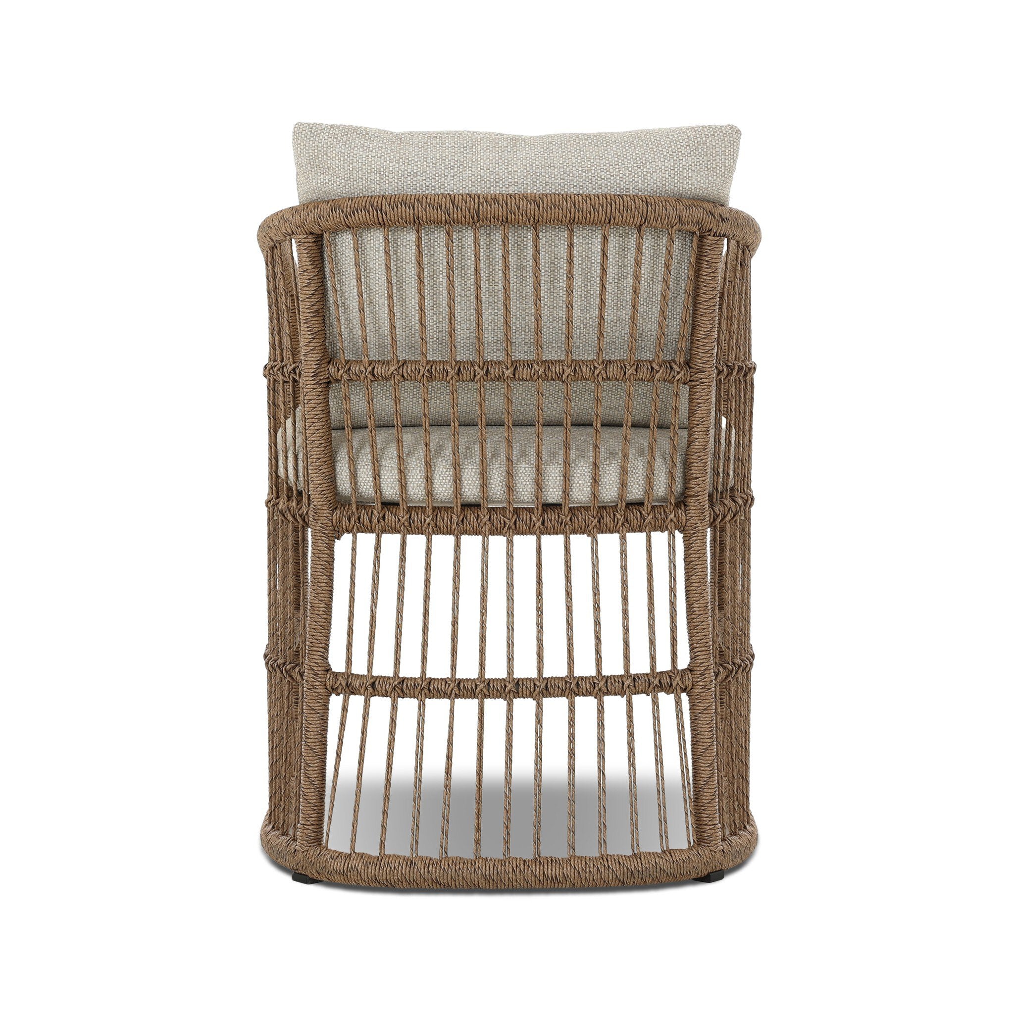 Wicker chair with a cushion on a white background