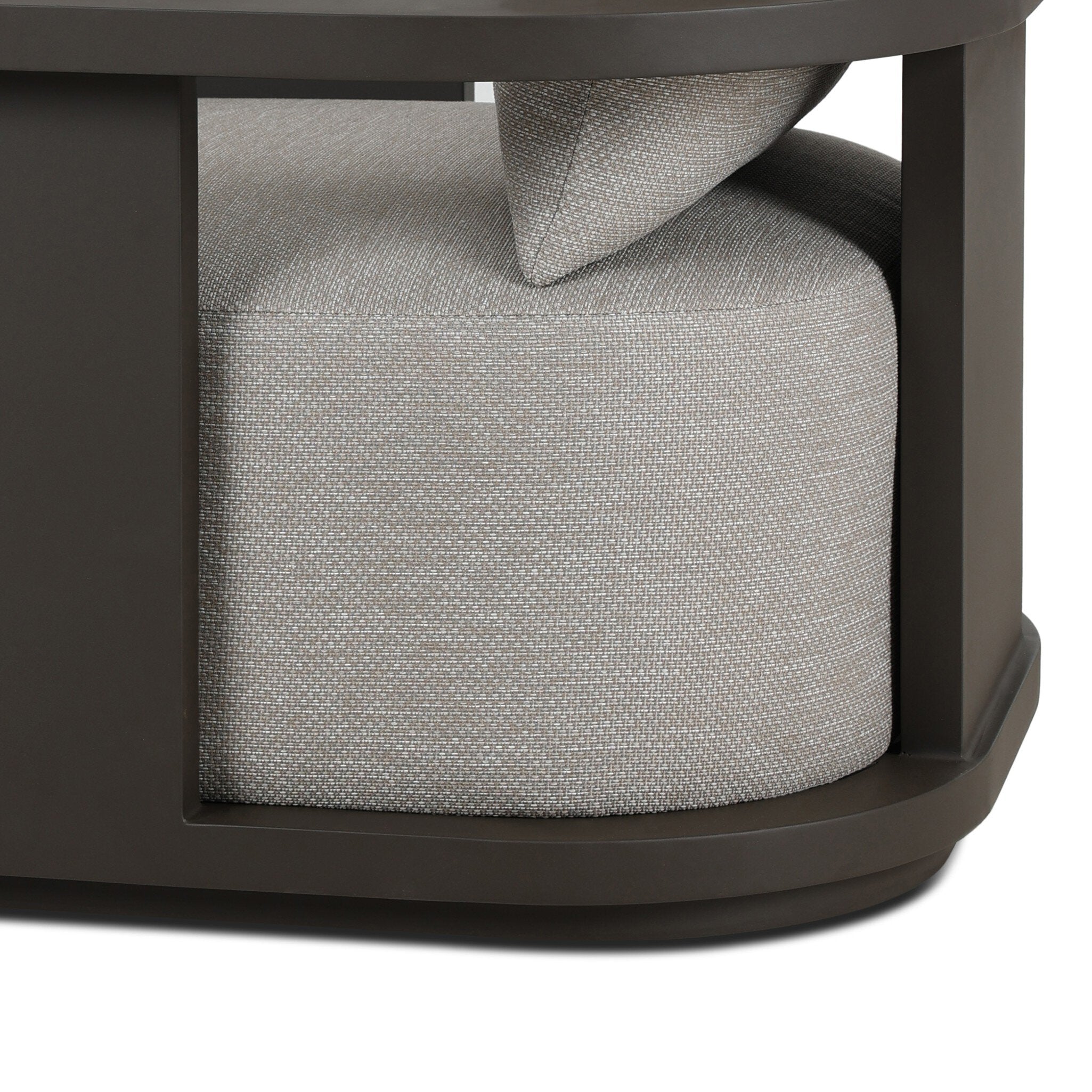 Close-up of a textured gray cushion on a dark brown frame