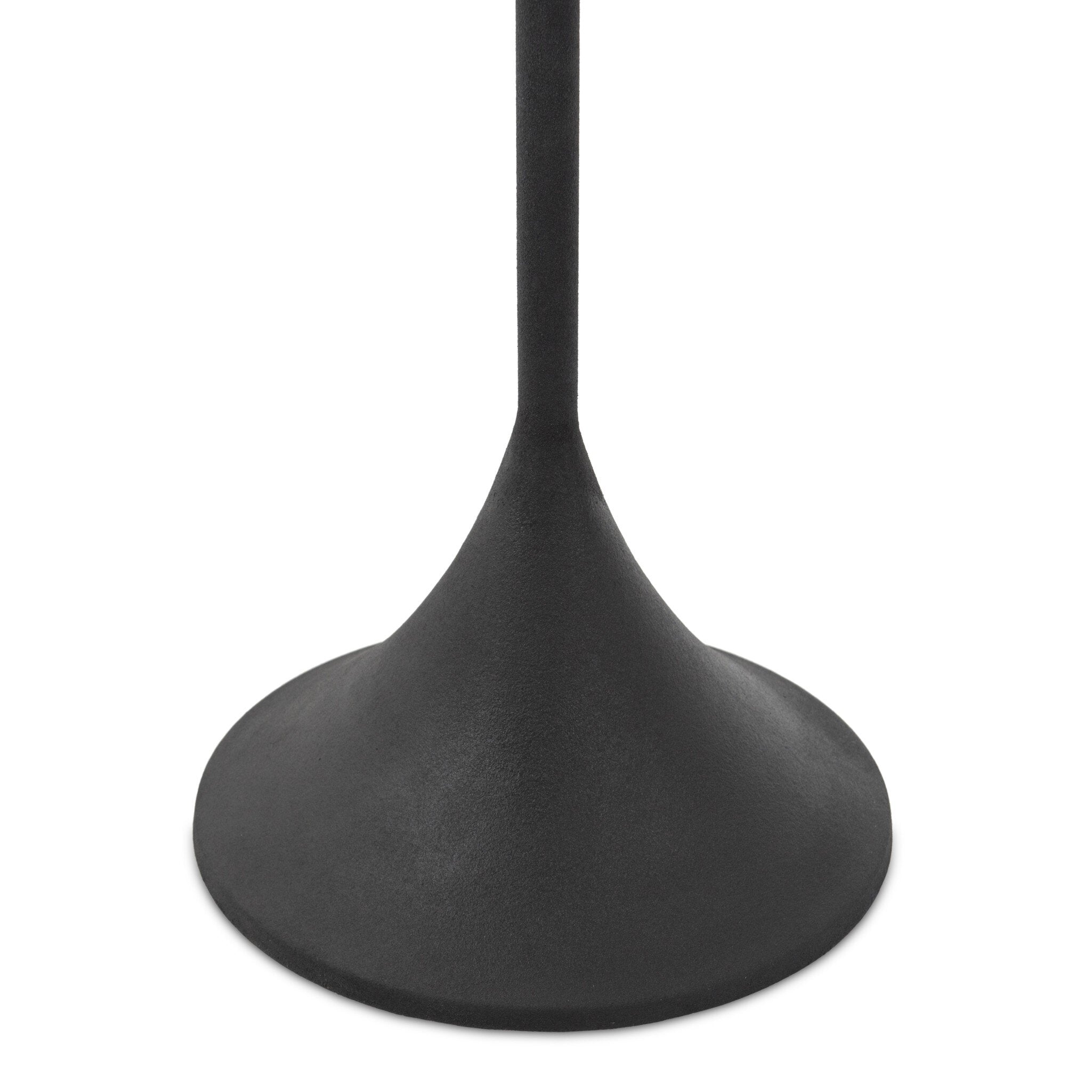 Black pedestal lamp base on a white background