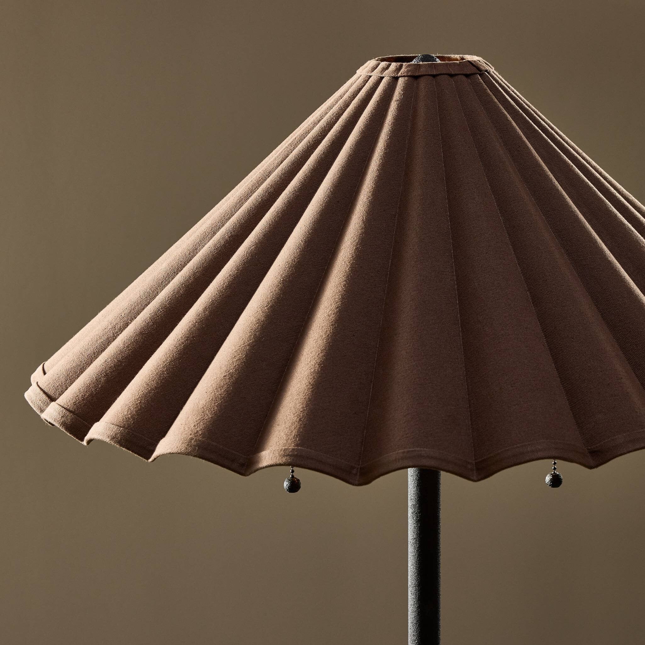 Brown lampshade on a plain background