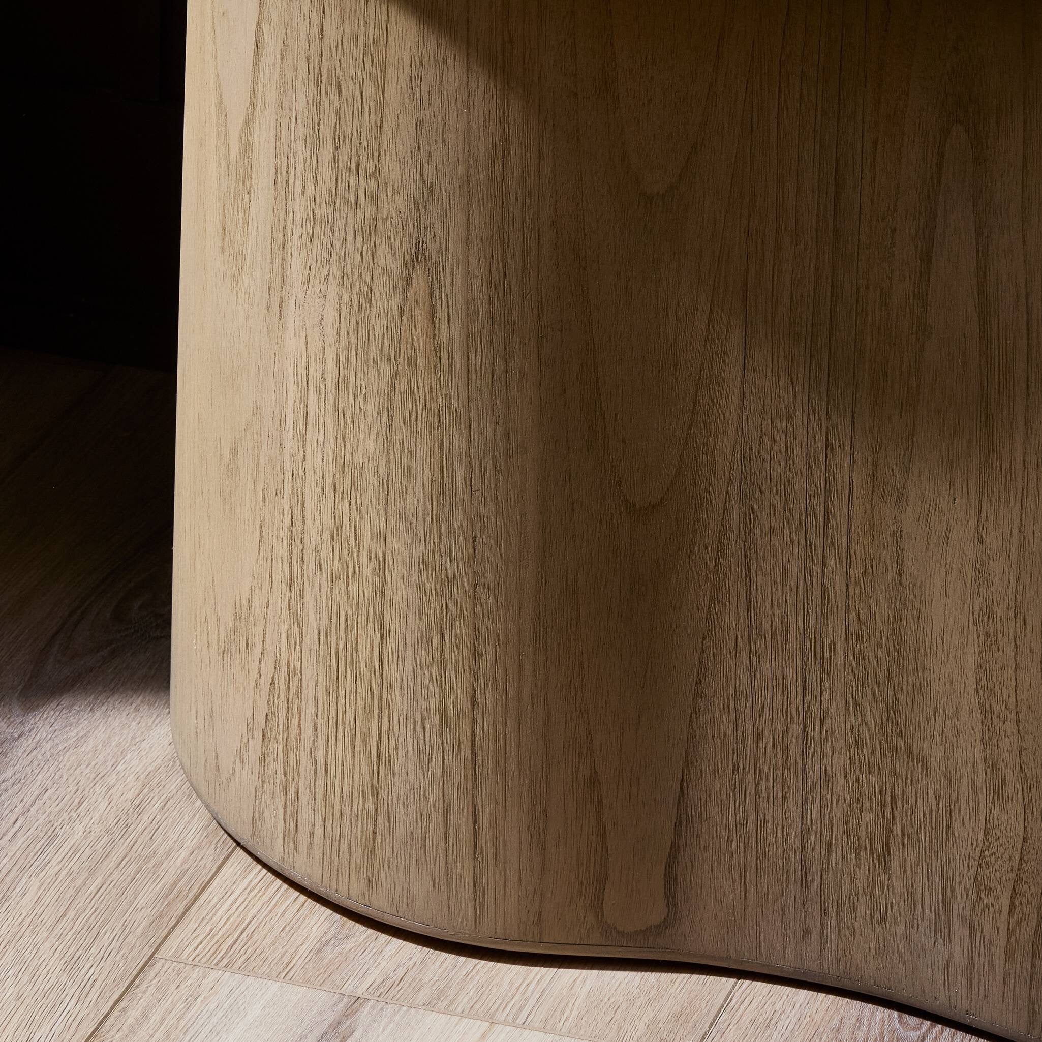 Close-up of a wooden nightstand on a wooden floor