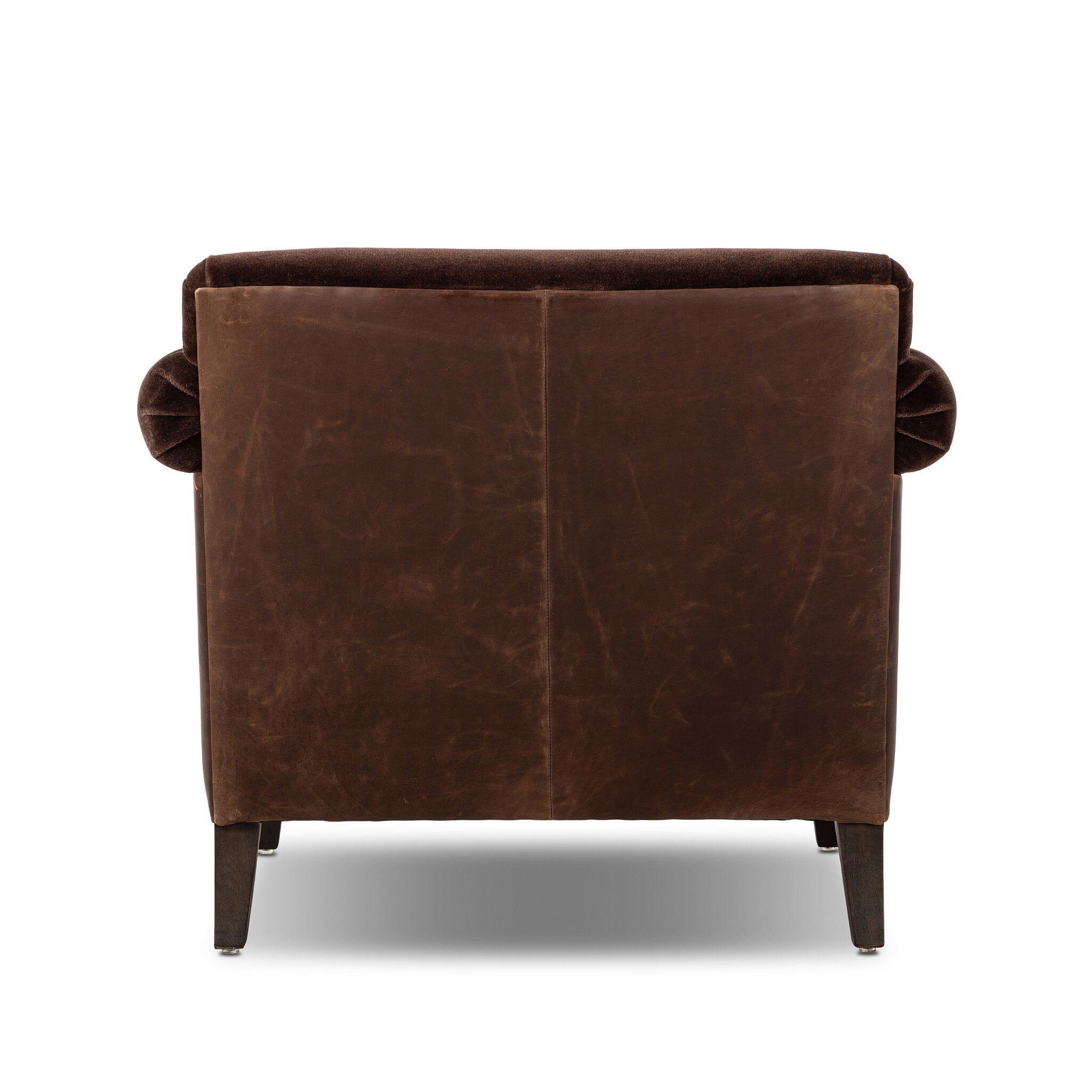 Brown leather armchair on a white background