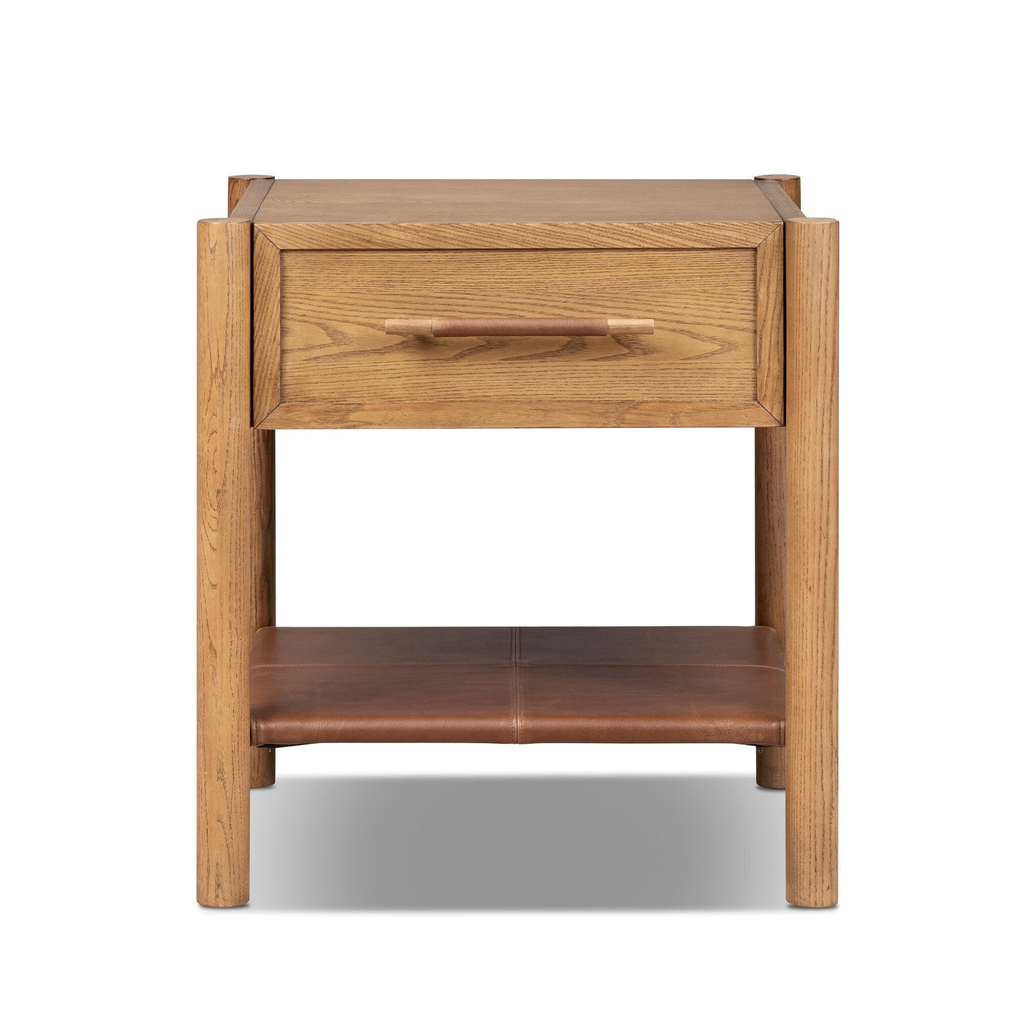 A modern oak wood nightstand with a single drawer, a matching wood pull handle, and a lower leather shelf, shown against a plain white background.