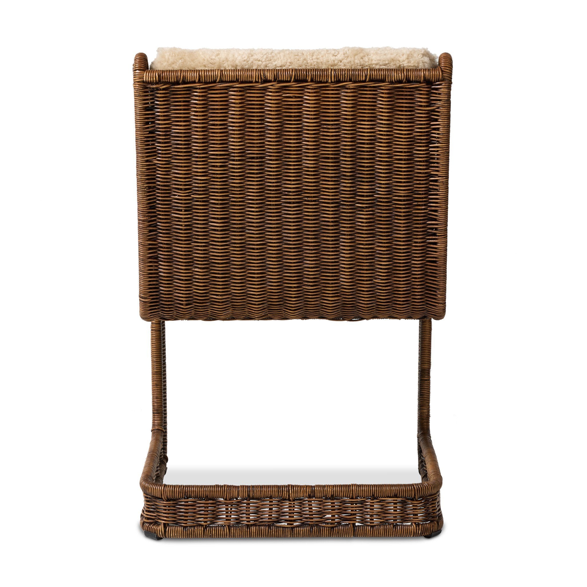 Wicker stool with cushion on a white background