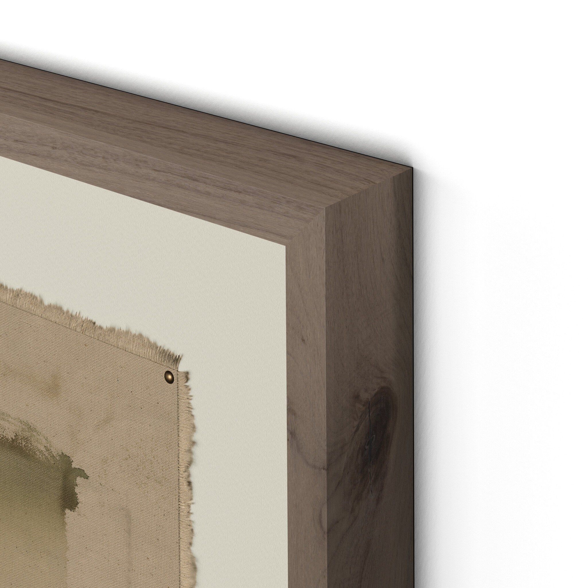 Close-up of a wooden picture frame corner with a white background