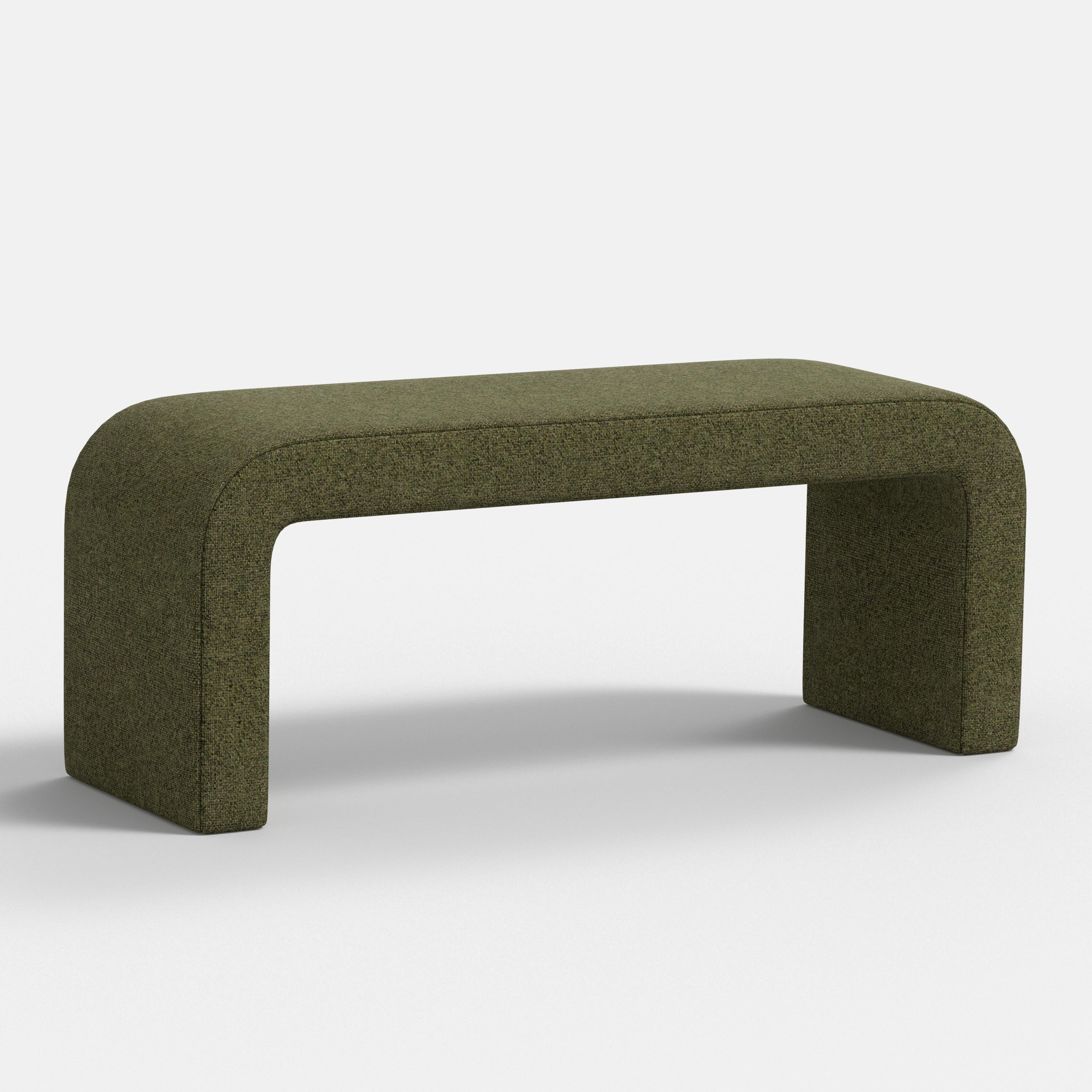 Green upholstered bench on a white background