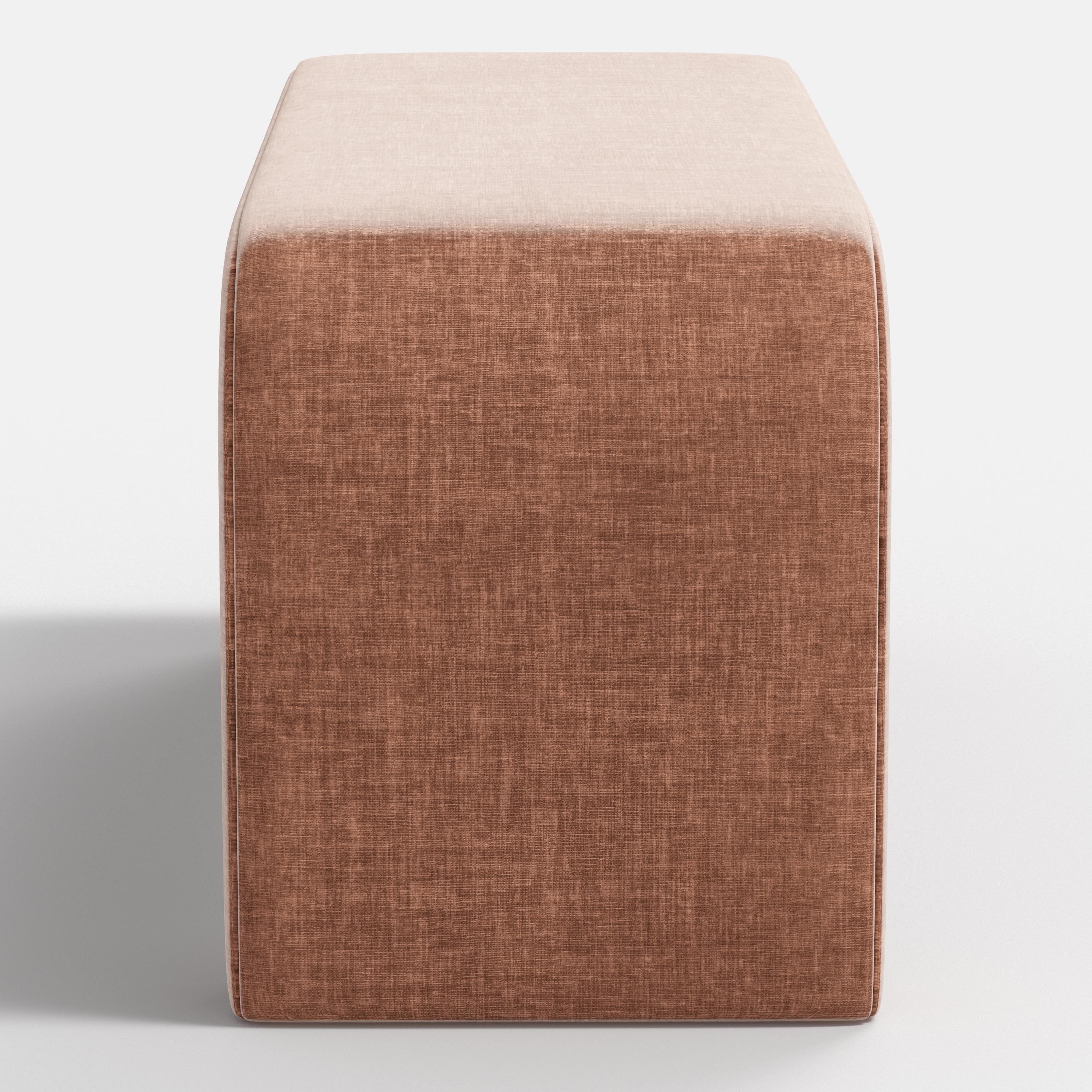 Brown cube-shaped ottoman with a beige top on a white background